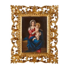 Pair of Porcelain Plaques in Giltwood Frames, After Old Master Madonnas