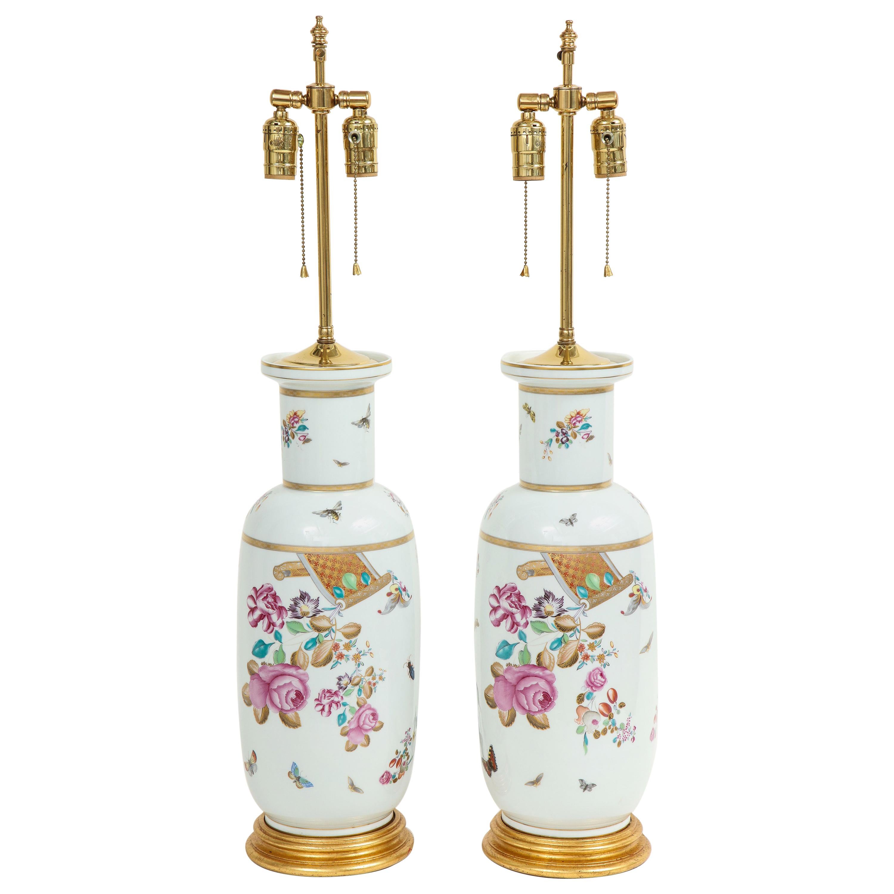 Pair of Porcelain Polychrome and Gilt Rouleau Vase Lamps