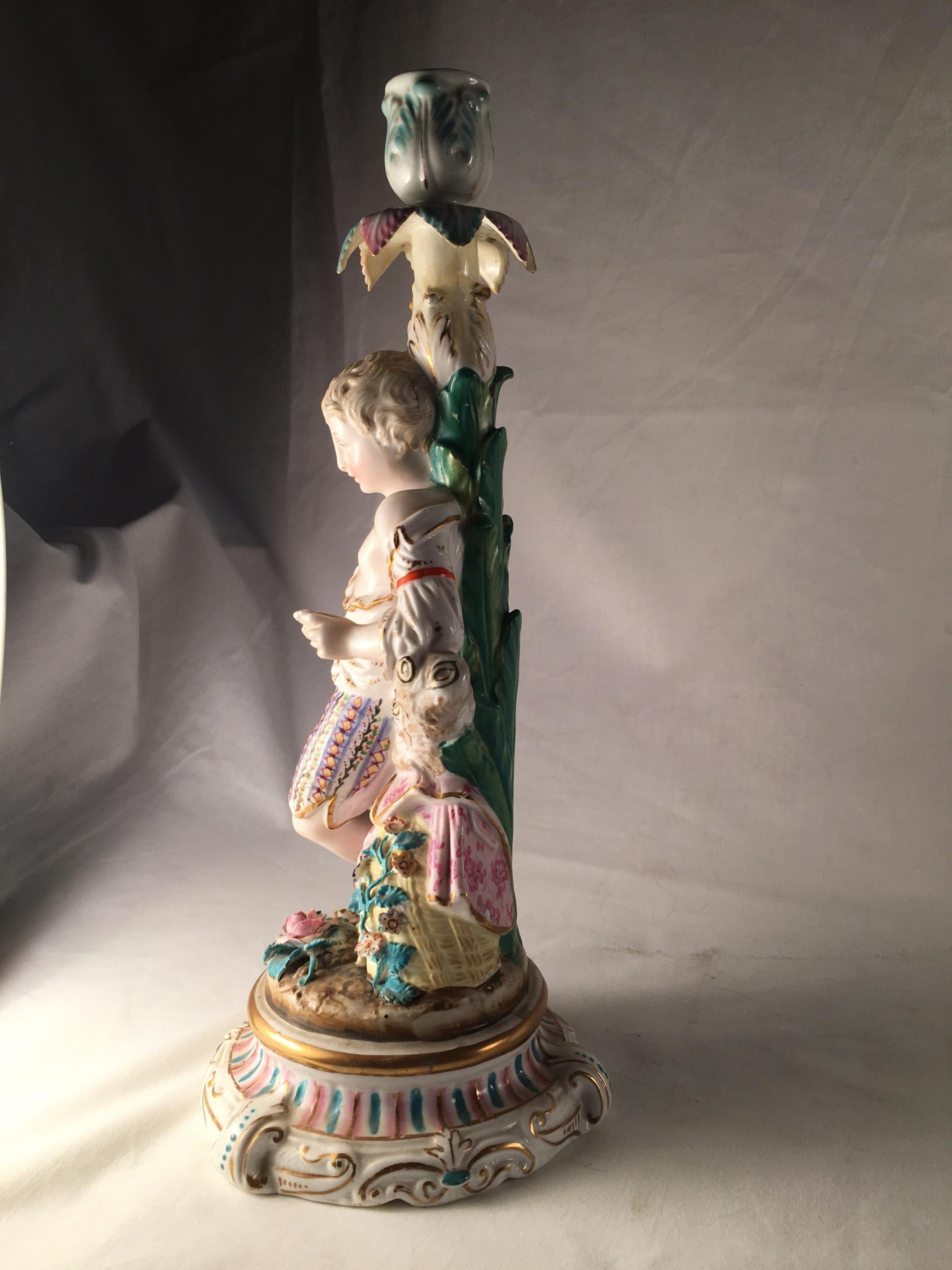 19th Century Pair of Porcelain Rococo Style Figural Candlesticks, ca. 1850 For Sale