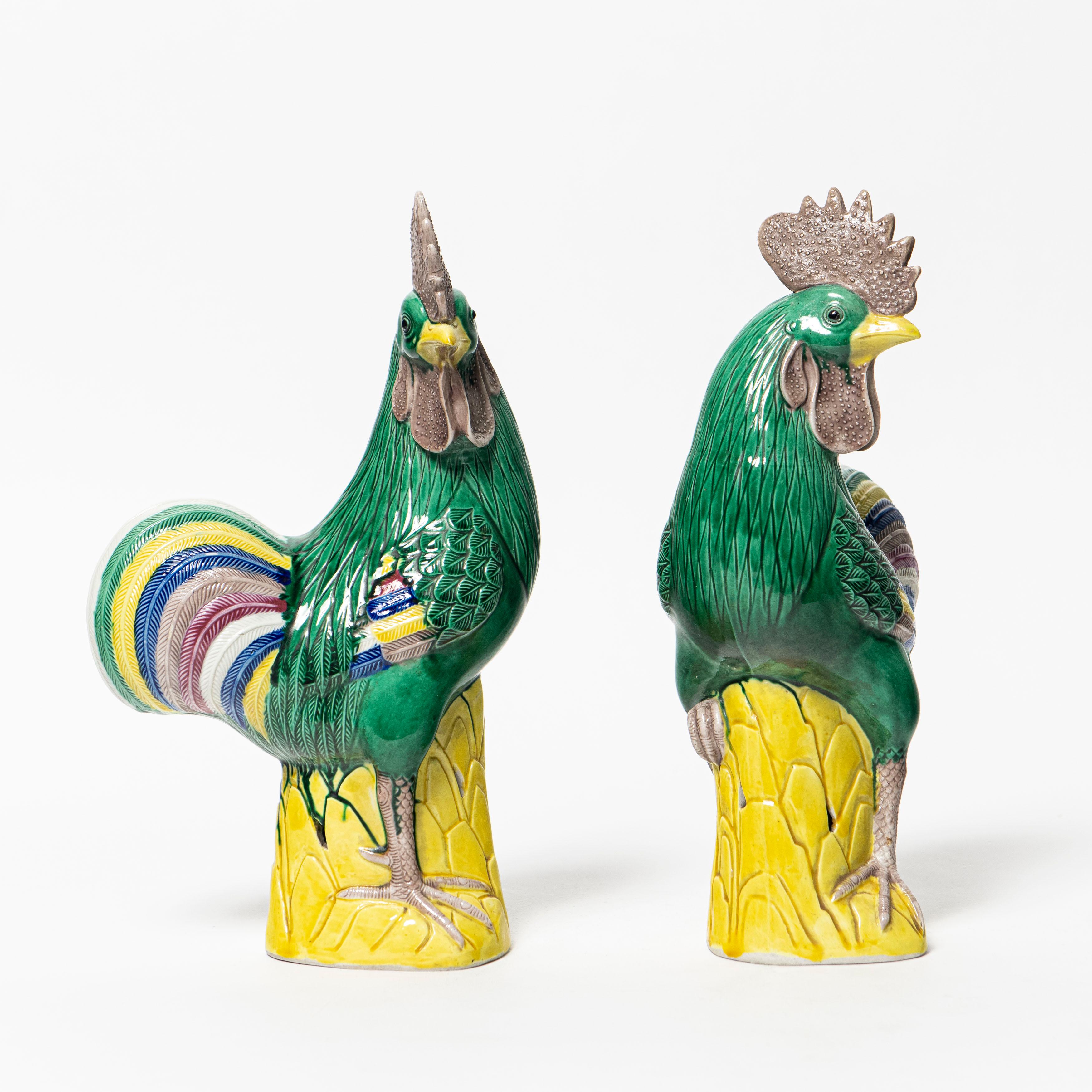 Pair of porcelain roosters sculptures. China, early 20th century.