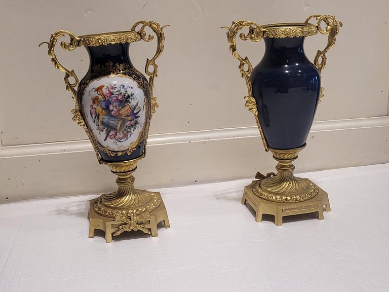 Molded Pair of Porcelain Vases For Sale