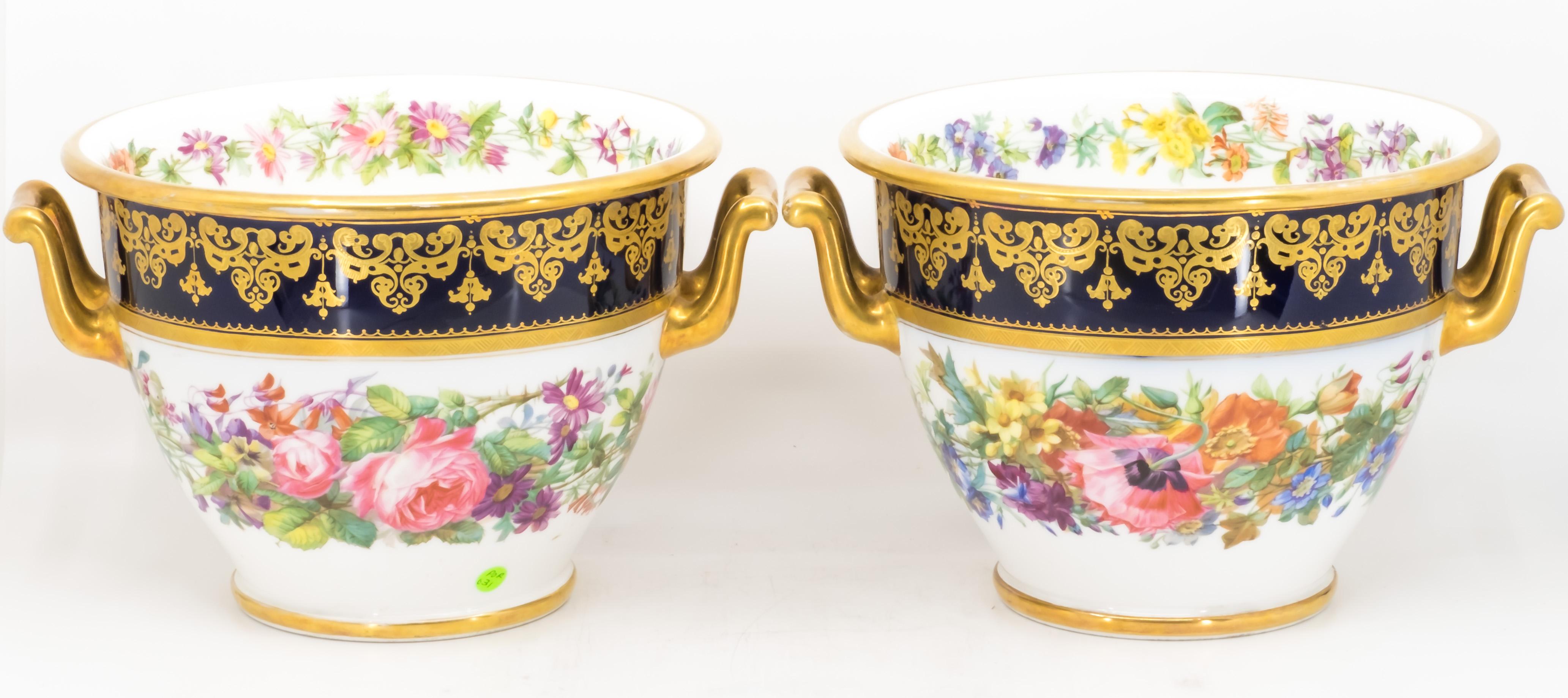 Pair of porcelain vases, French, 19th century, mark for Sevres
Hand painted porcelain with very refined floral design. The flower painted in free style reflects the high artistic achievement of French porcelain painted, 19th century style. 
Mark for