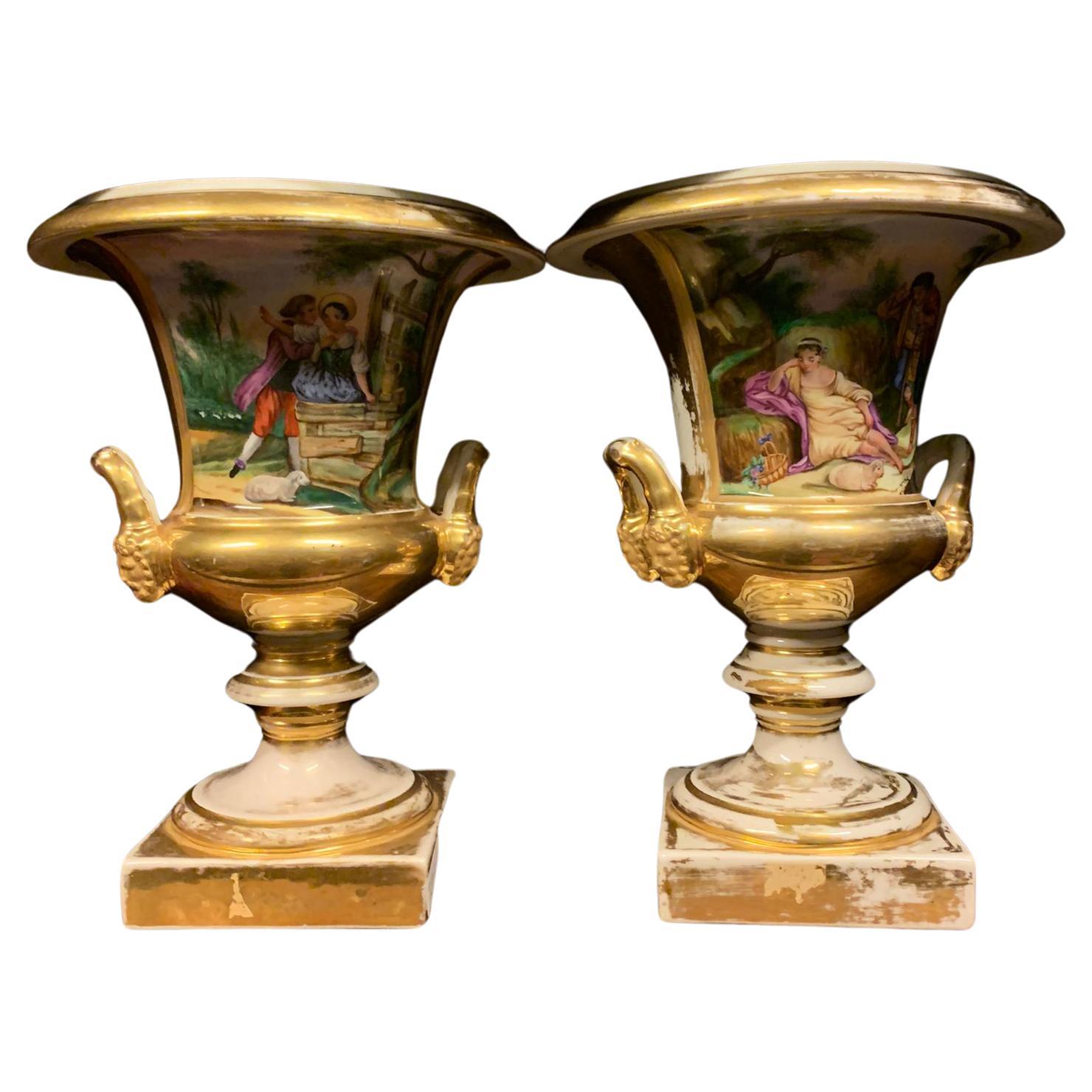 Pair of porcelain vases, polychrome with bucolic scenes and gilded edges, Italy For Sale