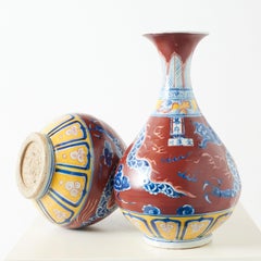 Pair of Porcelain Vases with Dragon and Lotus Motifs