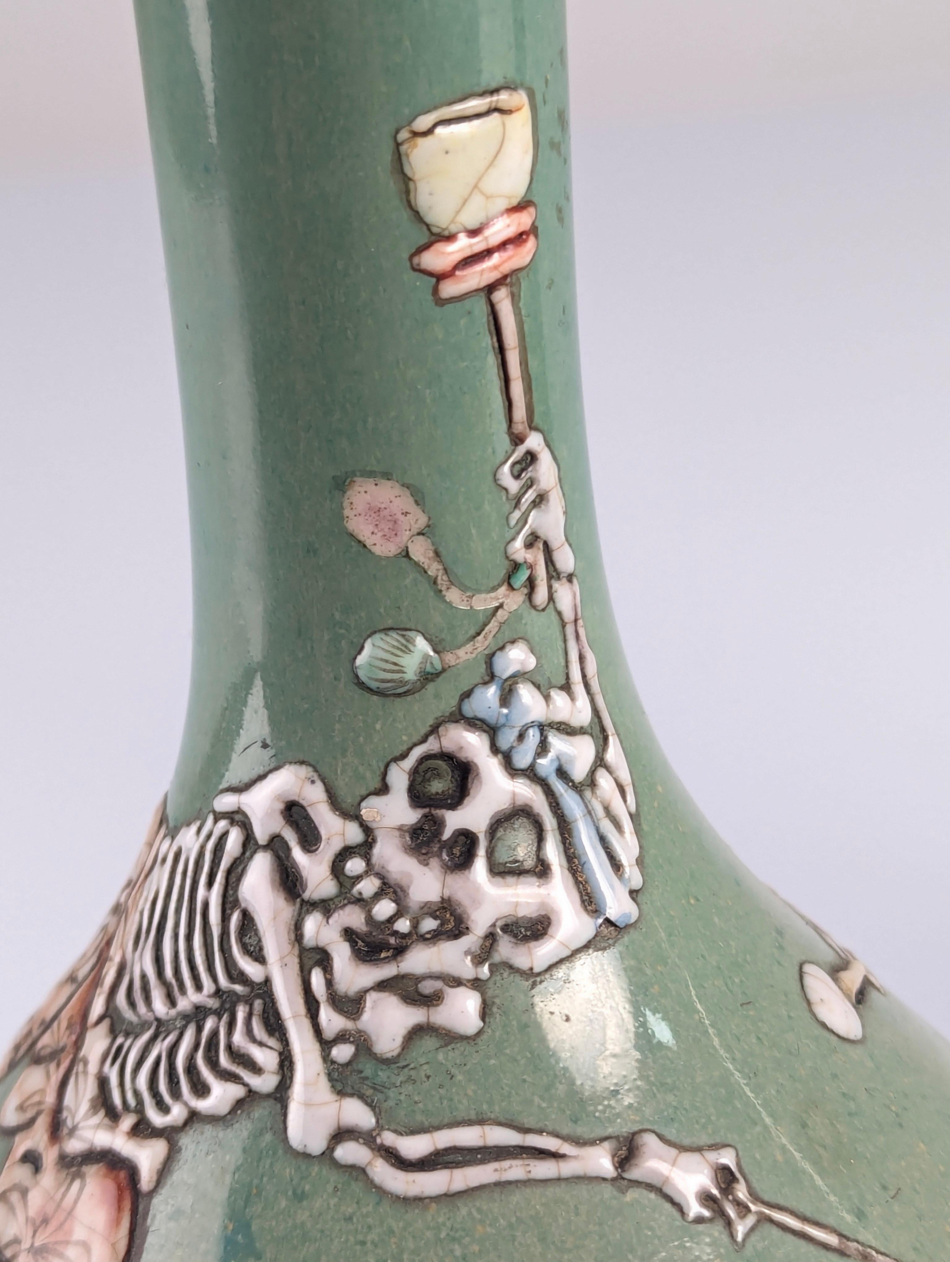 Japanese Pair of Porcelain Vases with Skeletons in Relief, Signed, Japan Era Meiji/Taisho