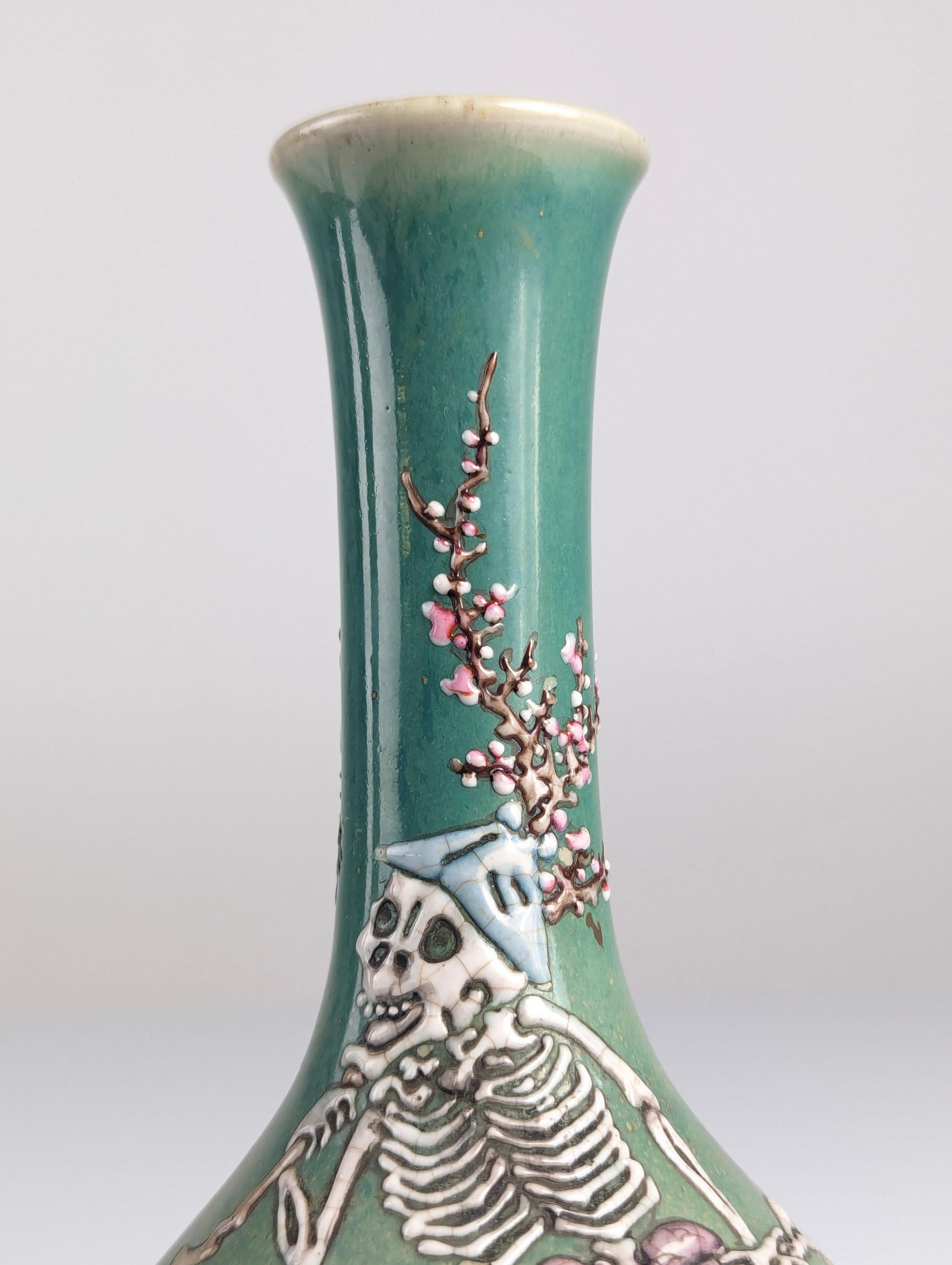 Pair of Porcelain Vases with Skeletons in Relief, Signed, Japan Era Meiji/Taisho 1