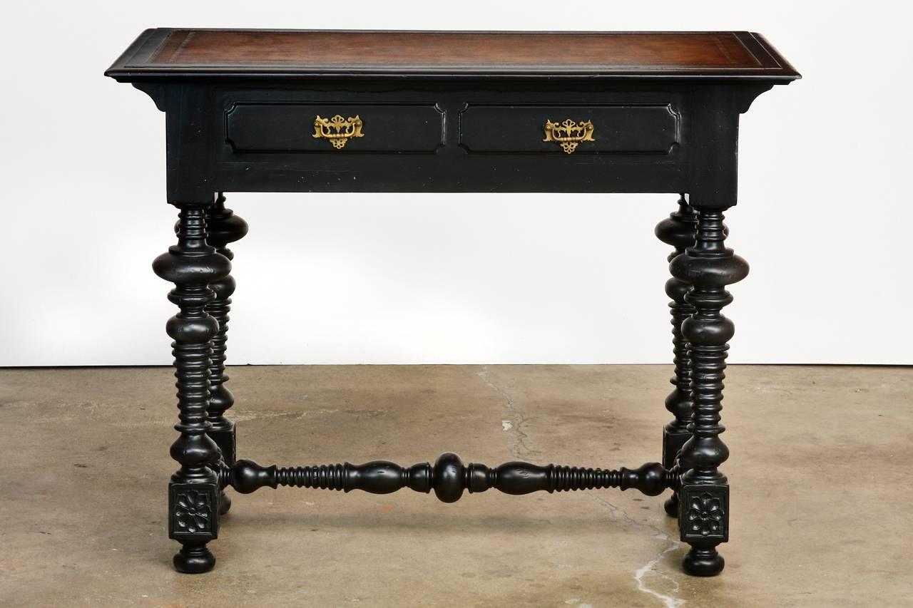 Fabulous pair of Portuguese style carved library tables or writing tables by John Richard. From the 
