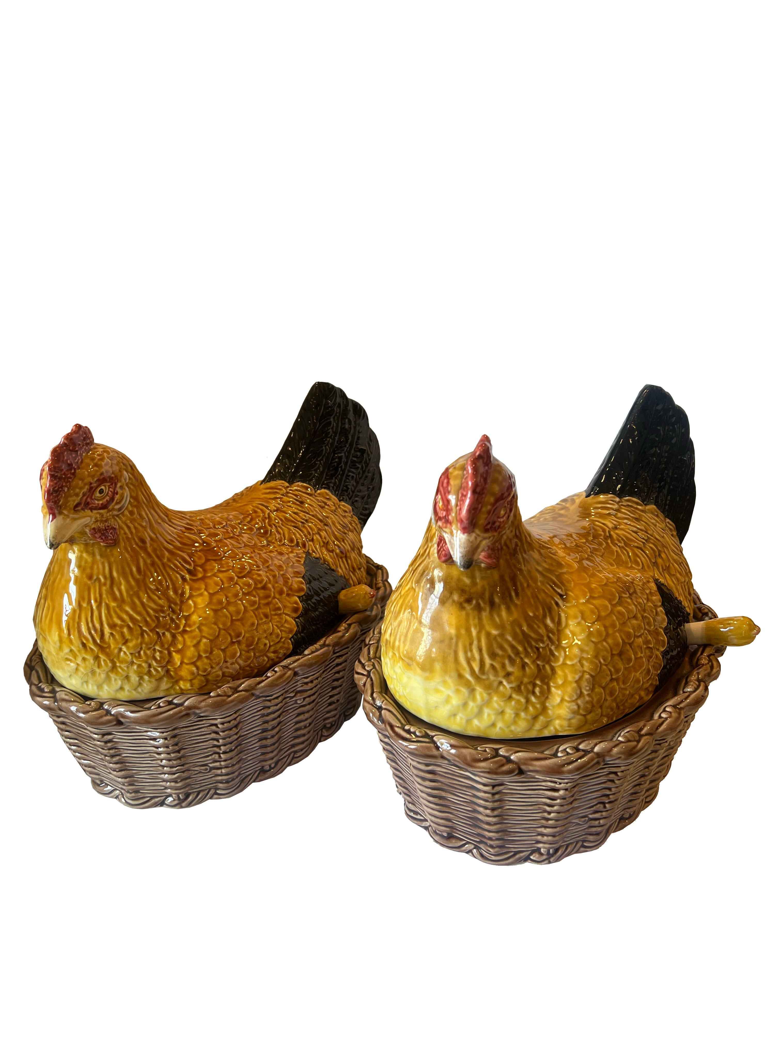 A delightful pair of vintage soup tureens in the form of hens, adding a whimsical touch to your dining experience. Crafted with meticulous artistry, these unique tureens are accompanied by coordinating ladles cleverly shaped like eggs. Expertly