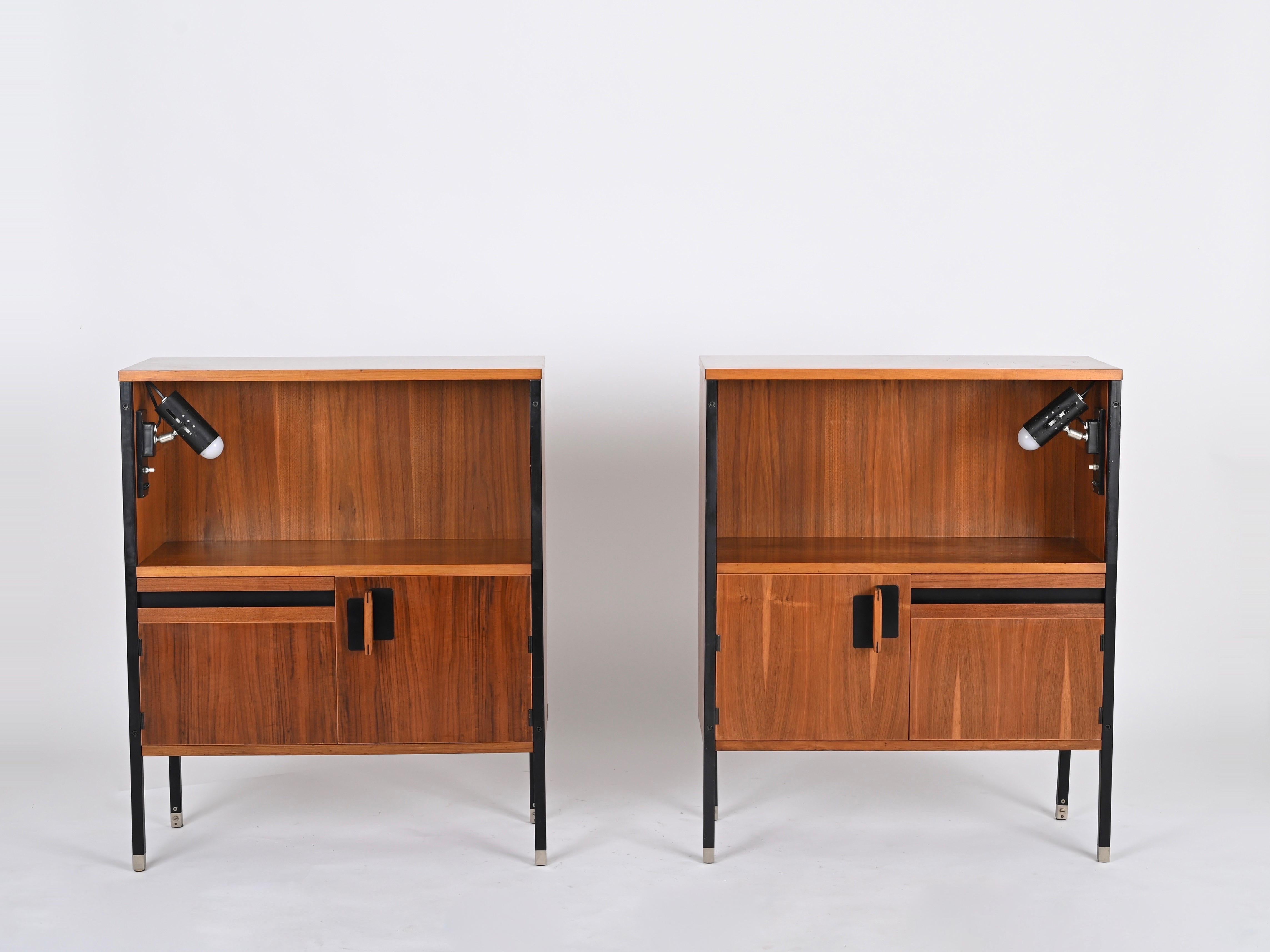 Stunning pair of Positano nightstands in rosewood designed by Ico Parisi and produced by MiM Roma in Italy during the 1950s. They are signed inside.

These incredibly rare and unique pair of bedside tables are in amazing conditions, made in rosewood