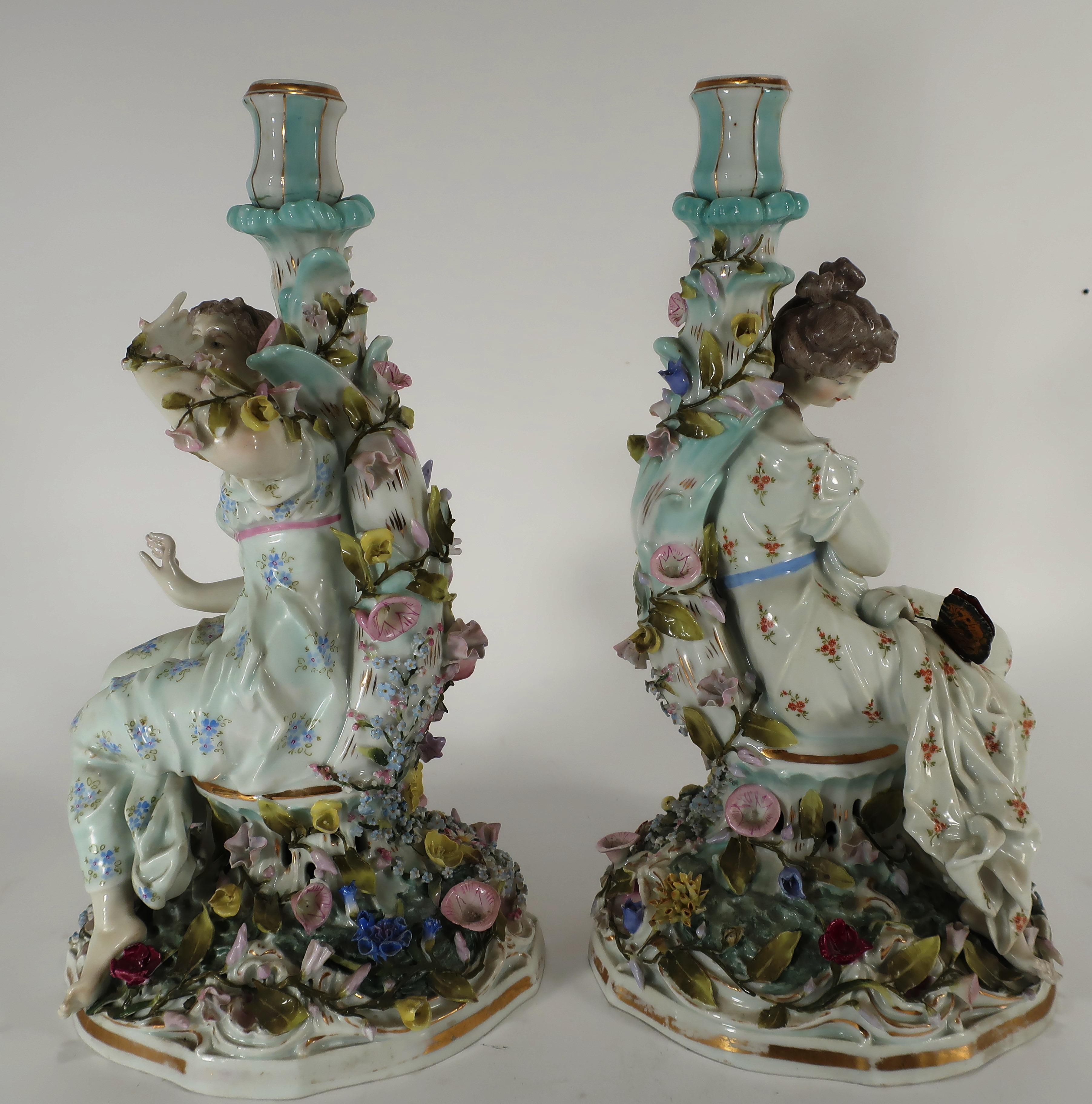 Pair of porcelain female figural candelabra, bears Meissen Mark. Removable candelabra one with four arms and the other with six arms. From the Cascone collection of Arts and Antiques.