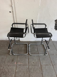 Pair of post modern Black leather Chrome Bar stools style of Mart Stam
