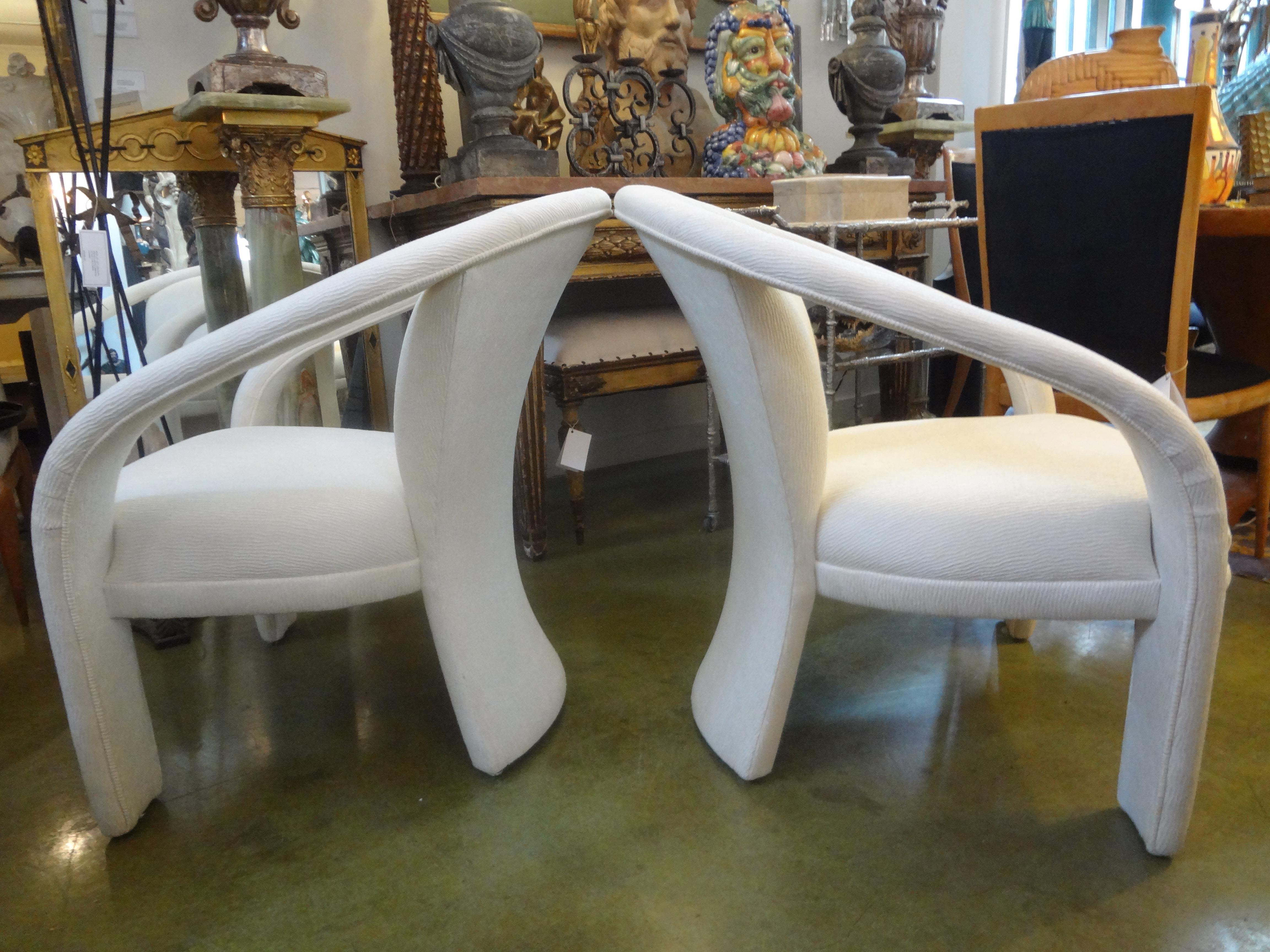 Pair of post modern lounge chairs by Marge Carson. These stunning sculptural upholstered lounge chairs are a Classic post modern design and extremely comfortable. These beautiful chairs were rarely used and the upholstery is in very good condition.