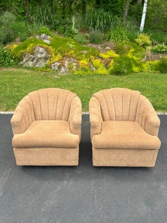 Pair of Post Modern Channel Back Barrell Swivel Chairs