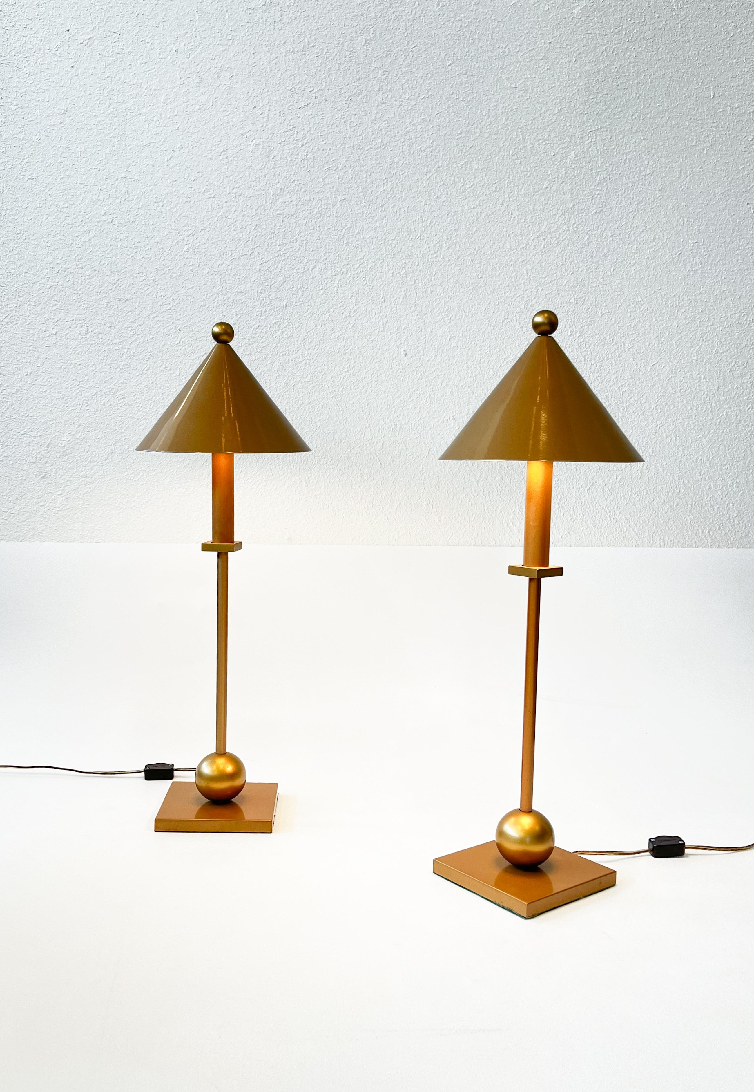 Pair of 1990’s Post-Modern small table lamps by Robert Sonneman for George Kovacs. 
Constructed of powder coated mustard gold aluminum with a glass reflector. 

In beautiful vintage condition, with minor wear consistent with age. 
Wire for US, they