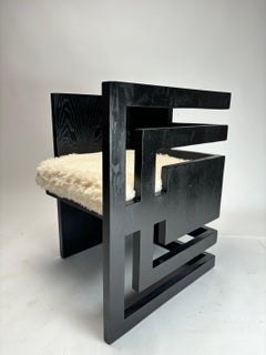 Pair of post-modern sculptural wooden armchairs, Italy, 1970s