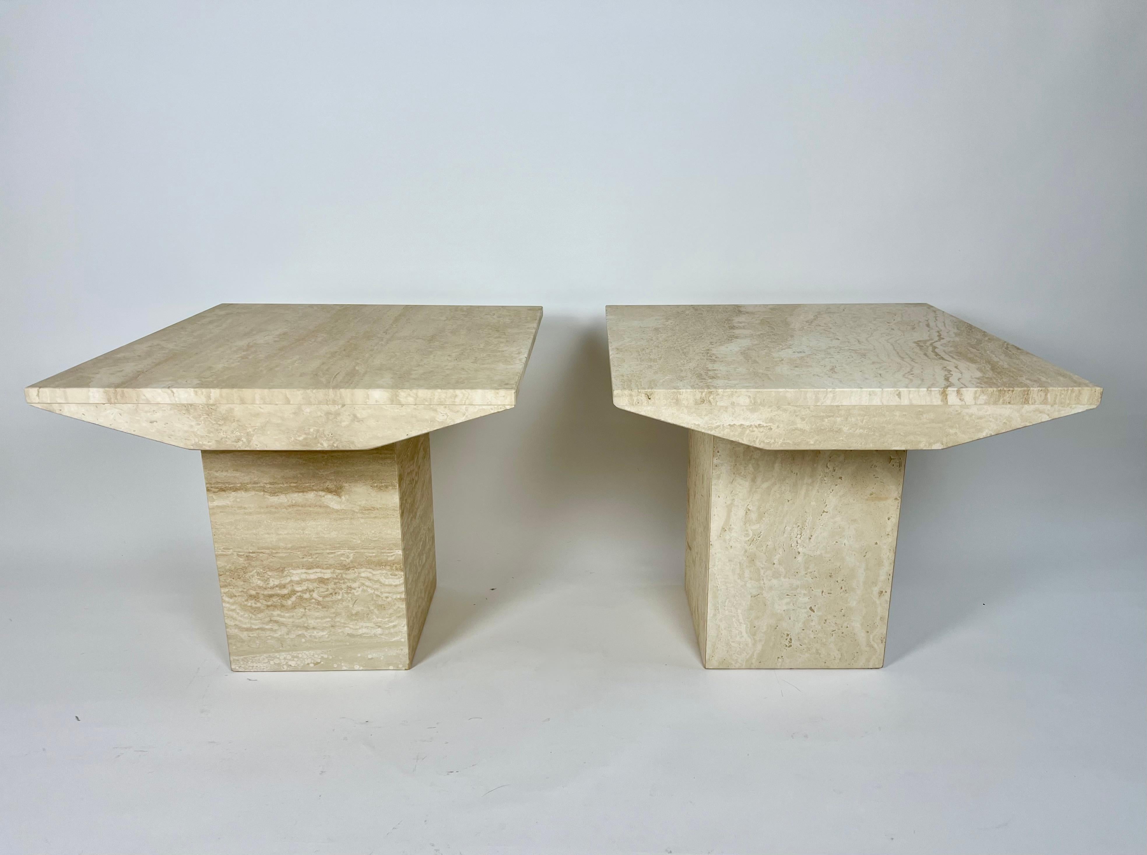 Square side table in natural travertine stone.

Mid to light tone travertine in a semi matt finish.

Excellent condition, no scratches, damage or stains.

Very heavy. Top and base are 2 separate pieces.

Available to buy individually (see our other