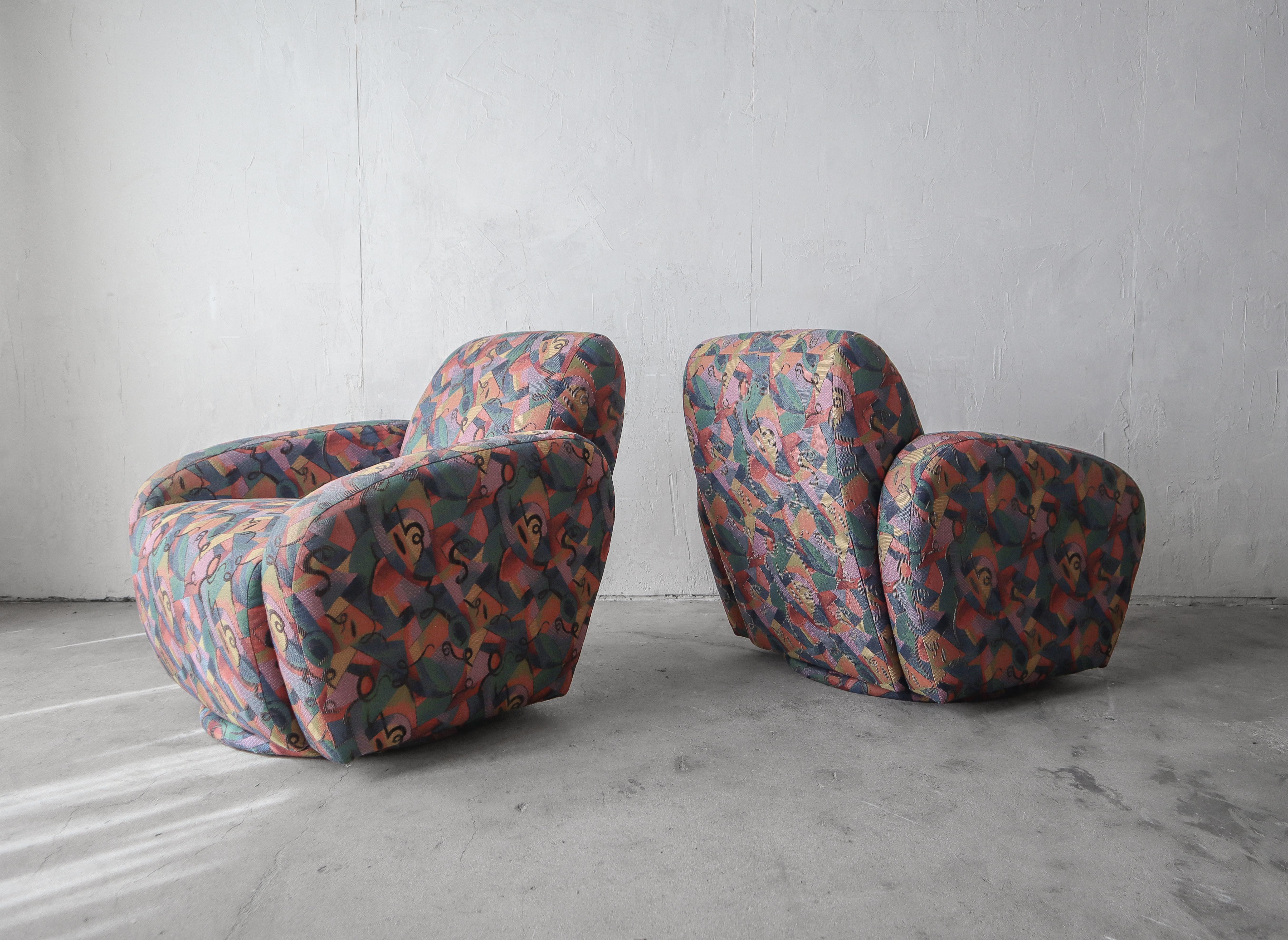 A nice pair of all original Post Modern swivel chairs by Preview Furniture.

The chairs are all original, left as found.  The chairs are structurally sound and the fabric is in good and useable condition, free of any damage, staining or odors.

The