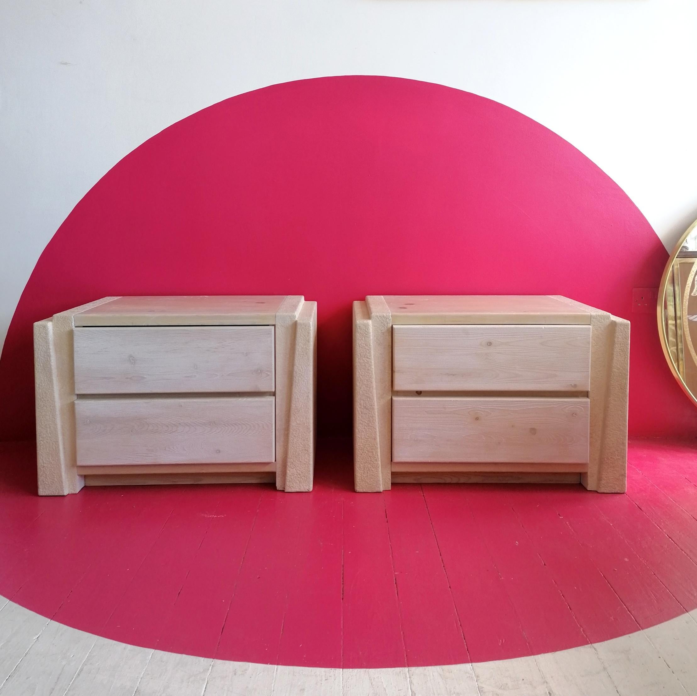 A pair of supercool large postmodern American nightstands / bedside cabinets, made from cerused / limed pine & textured plaster. They have a strong architectural look, with brutalist influences.
A bit of surface wear to the tops, commensurate with