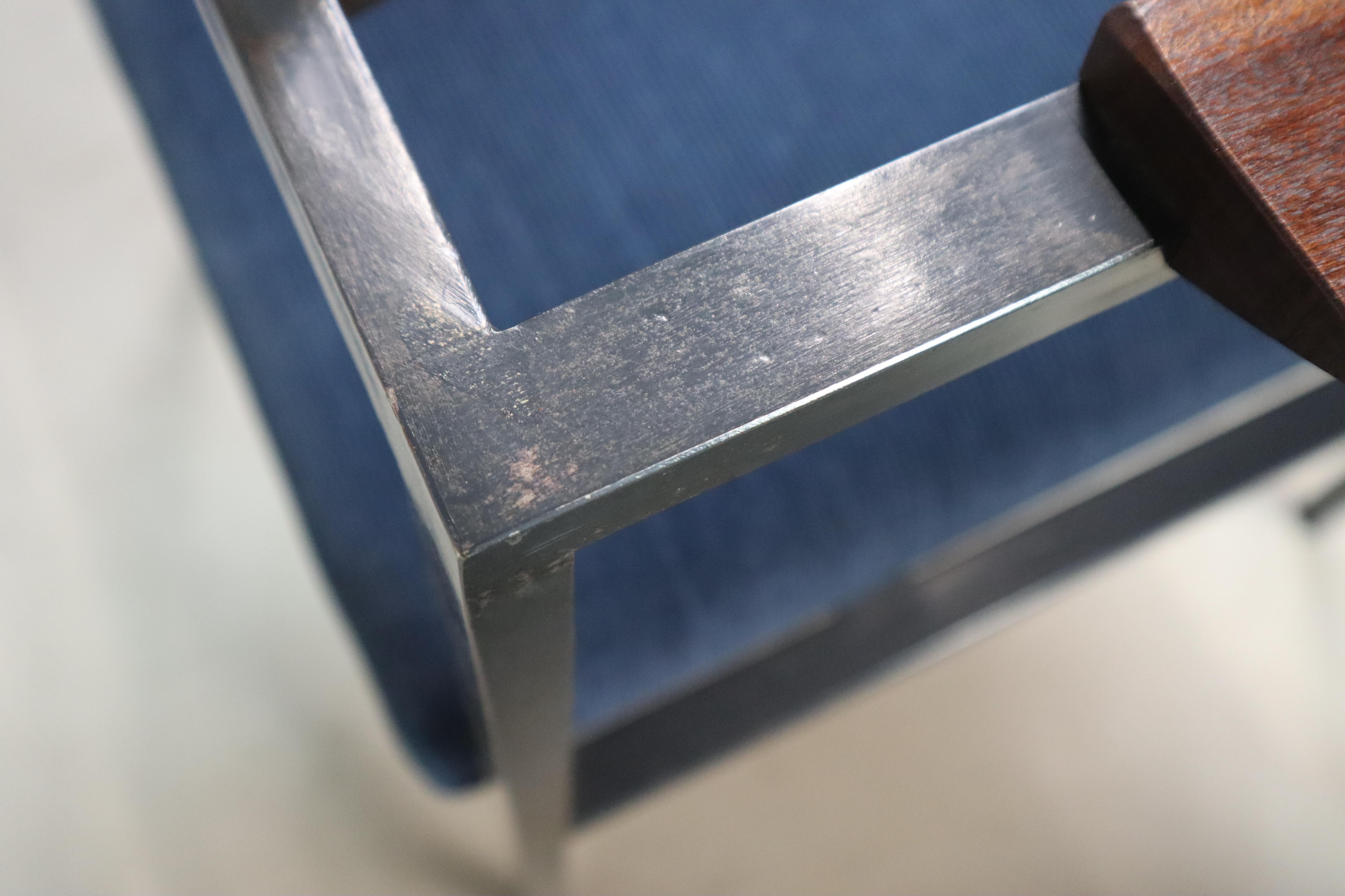 Pair of Postmodern armchairs in steel and mahogany, 1970s For Sale 12