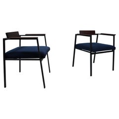 Pair of Postmodern armchairs in steel and mahogany, 1970s