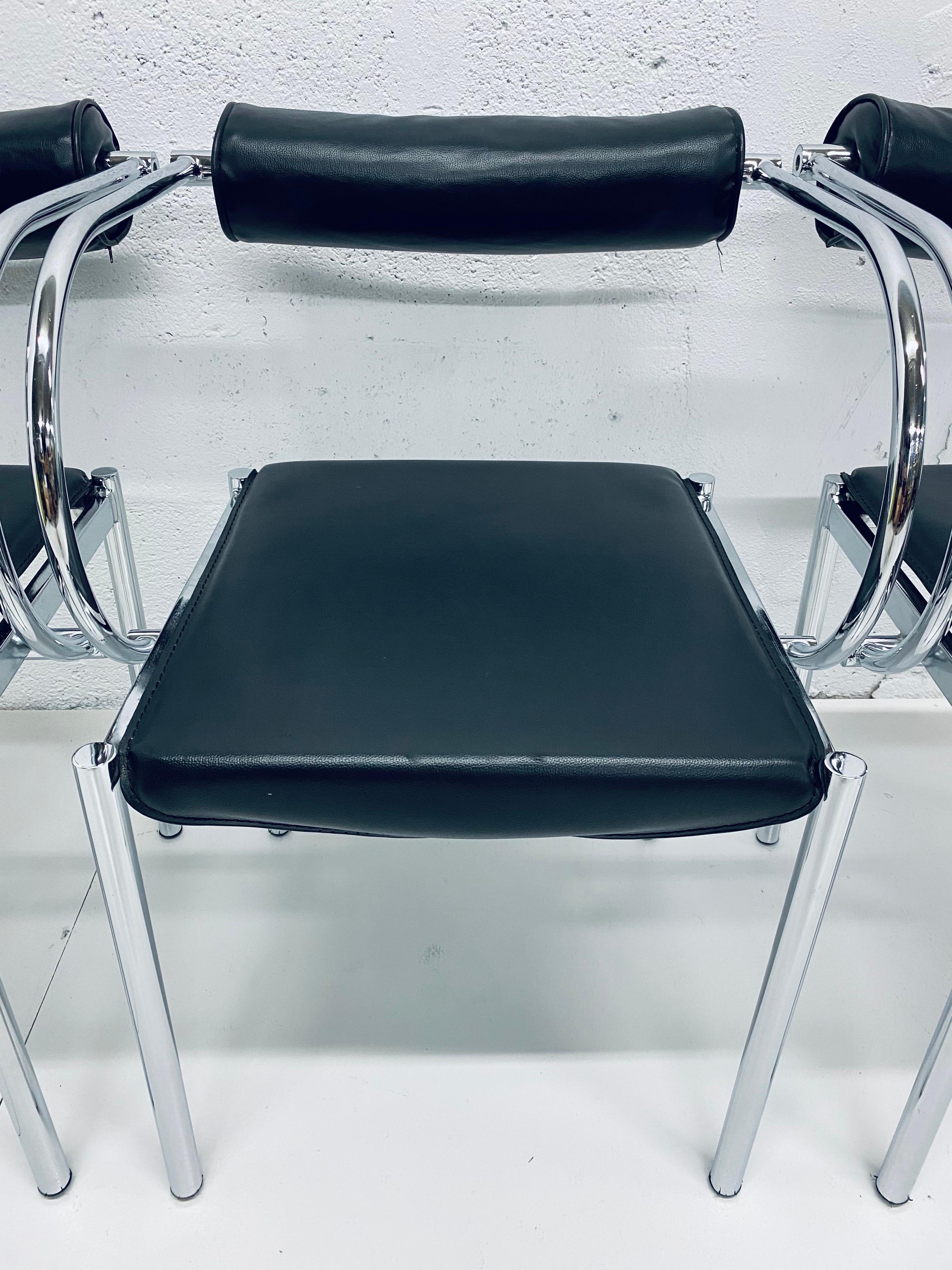 Post-Modern Pair of Postmodern Black Naugahyde and Chrome Dining Chairs
