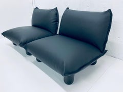 Pair of Postmodern Black Perforated Naugahyde Lounge Chairs, 1980s