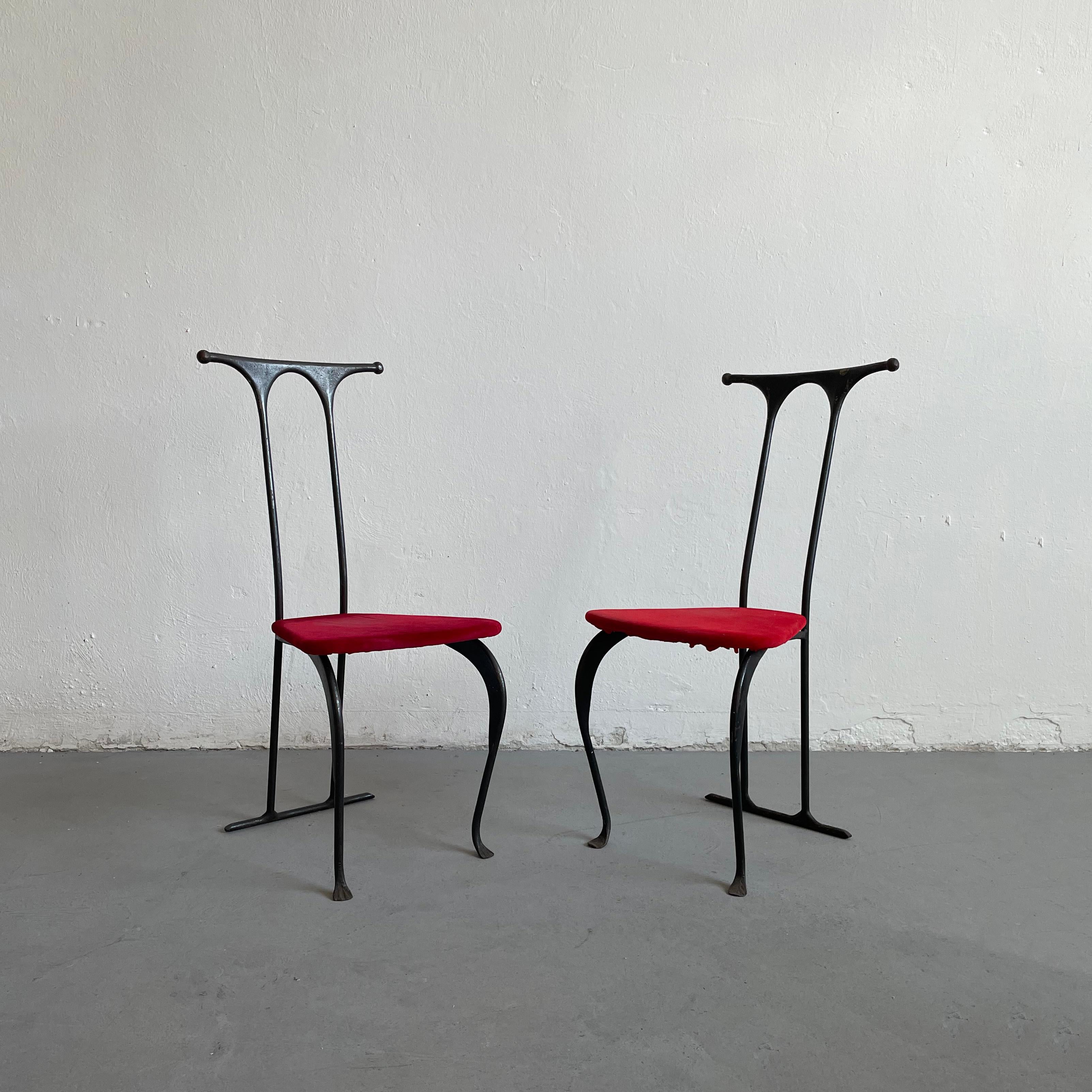 Pair of wrought iron brutalist chairs handcrafted in the 1980s by a Polish artist.

The chairs are in good original condition with age and use related wear marks. The fabric of the seats is worn and has some stains. The chairs are sold as