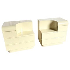 Pair of Postmodern Cream Lacquer Laminate Sculpted Two Tier Commodes/Nightstands