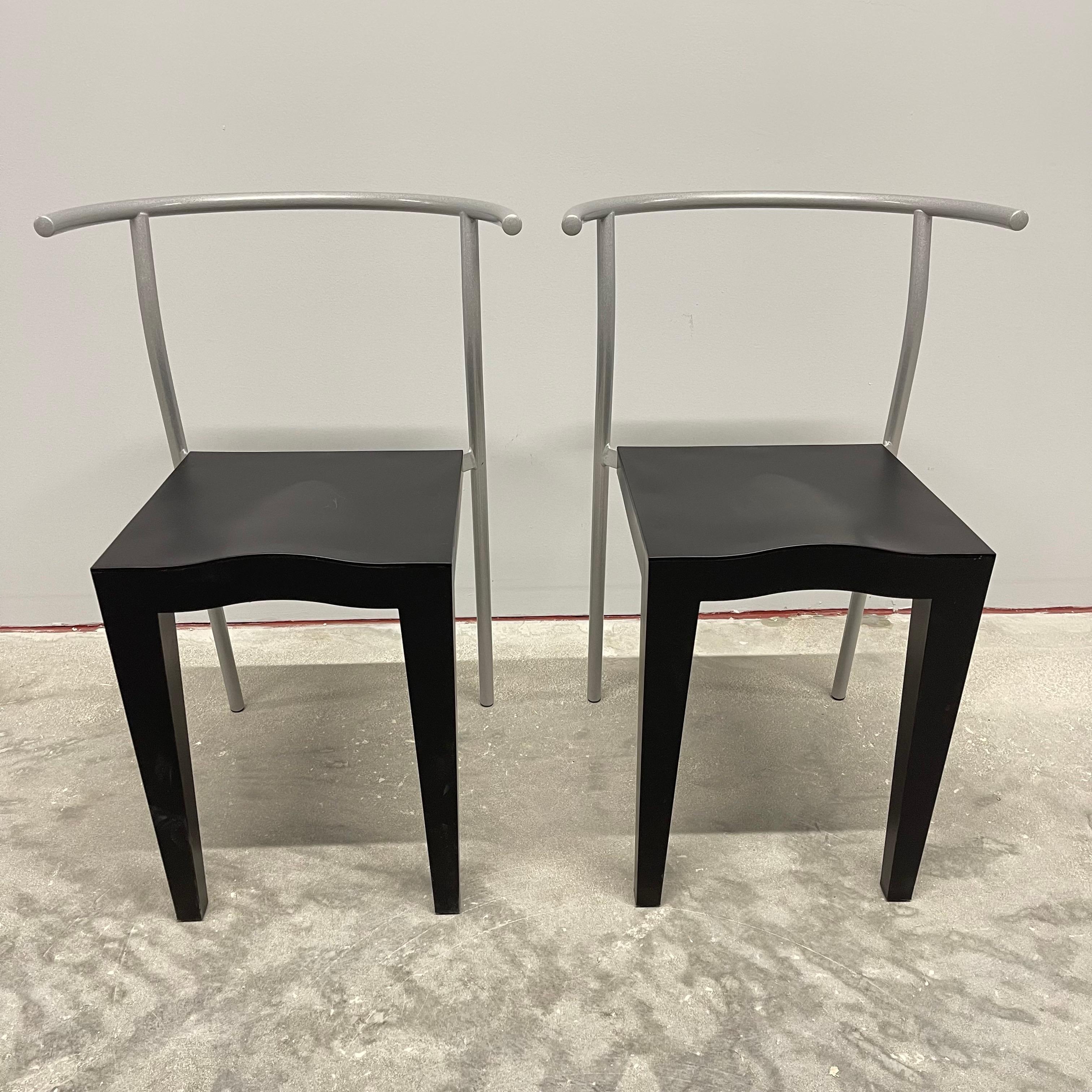 Pair of iconic Dr Glob chairs. Post modern design rendered in black molded propylene with a grey powder coated steel frame back and legs. Designed by Philippe Starck for Kartell, 1990.