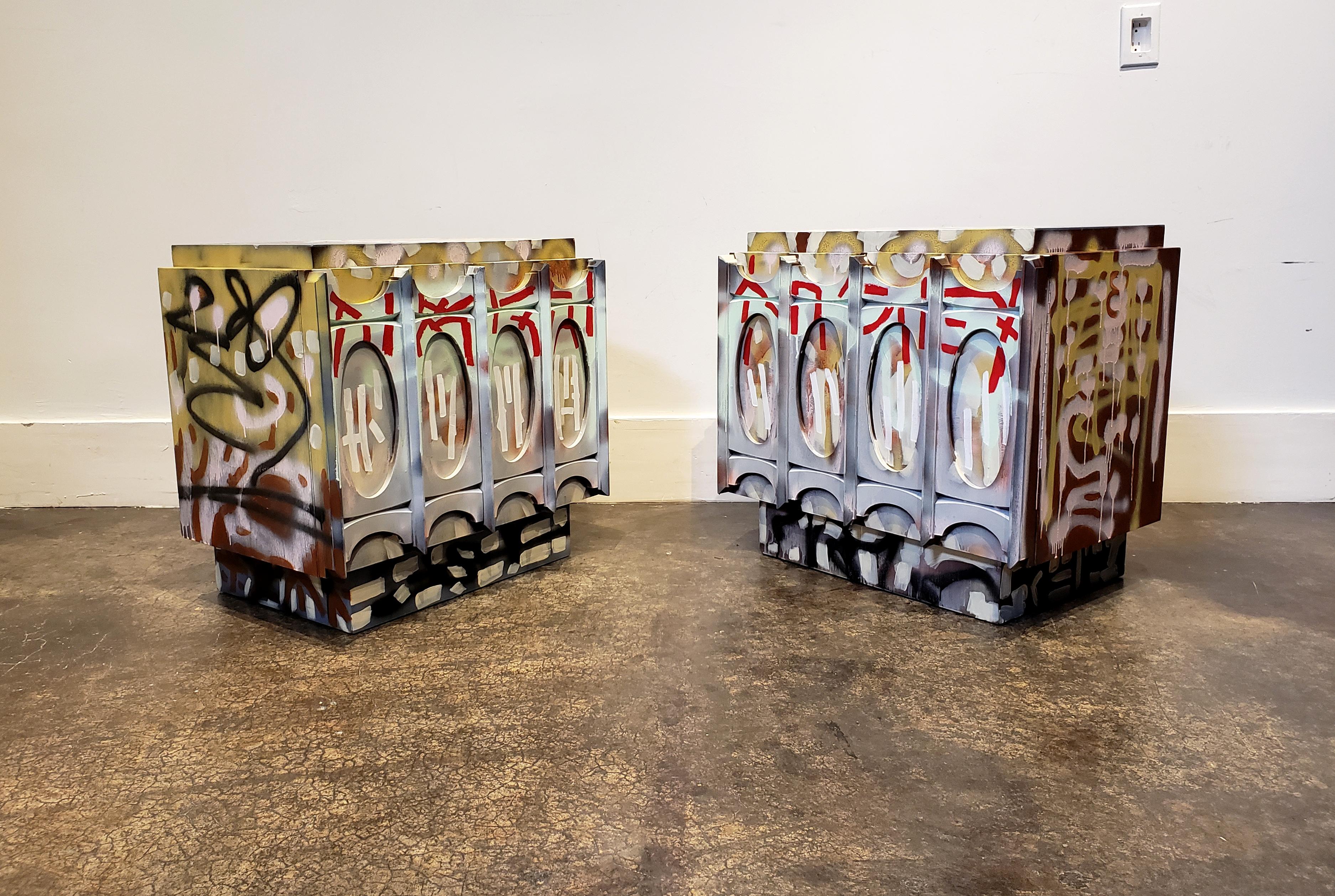All-over abstract composition hand painted in acrylic and spray-paint by artist Lionel Lamy on a pair of 1970s Brutalist nightstands. One of a kind pieces that are both art objects and functional furniture that really makes a room pop. Signed and