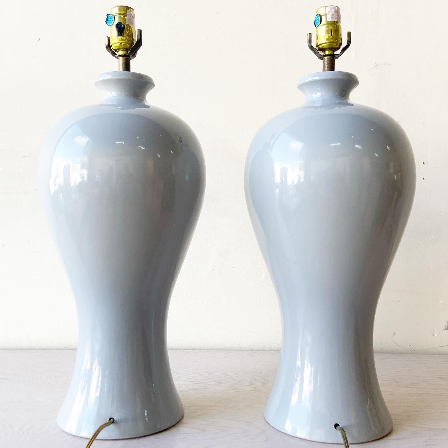 Beautiful pair of grey postmodern 3 way lighting table lamps.

Additional information:
Material: Porcelain
Color: Grey
Style: Postmodern
Time Period: 1980s
Dimension: 9