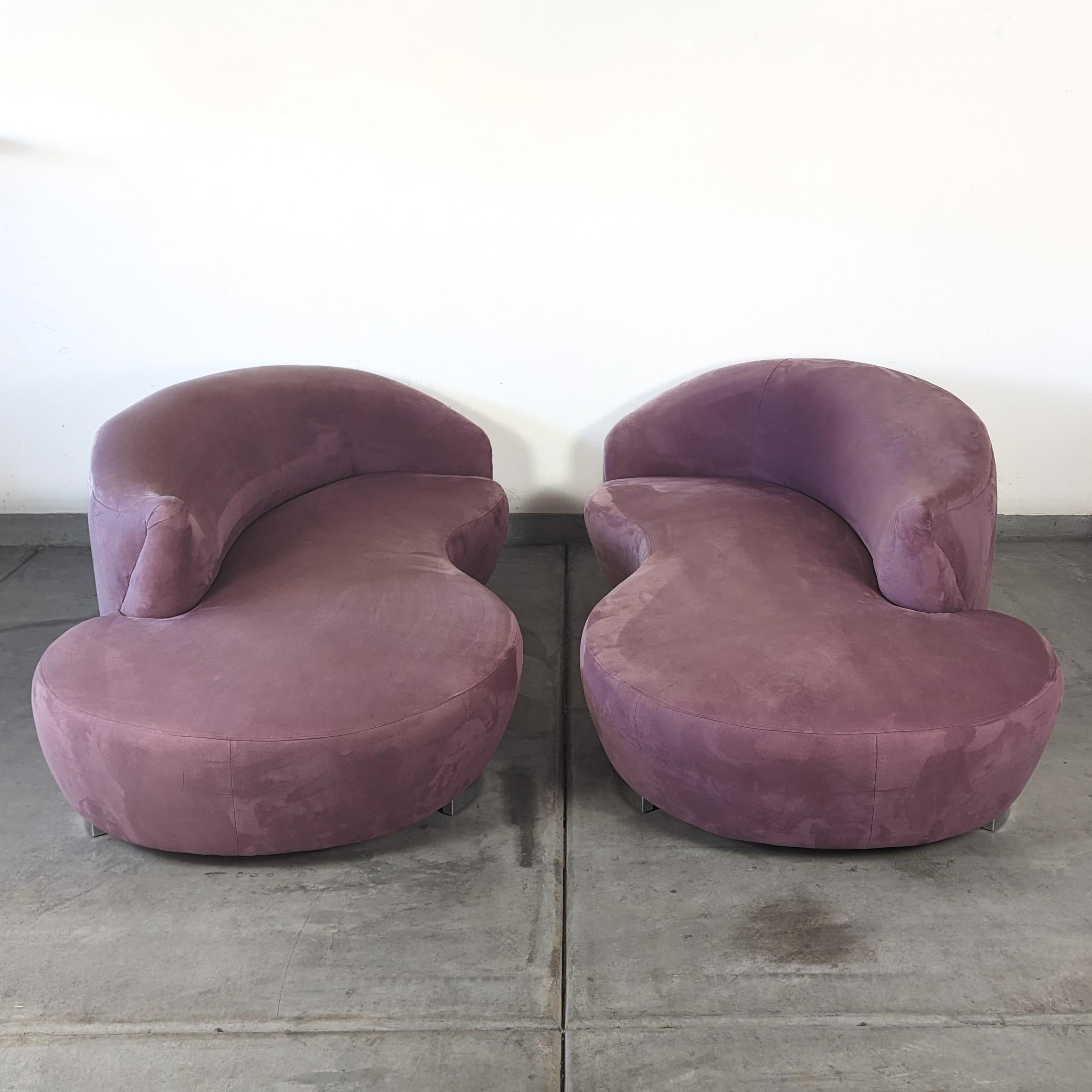 Nestled within the realm of timeless elegance and whimsical charm, this exquisite pair of vintage postmodern cloud sofas beckons to be the centerpiece of your living space. Crafted in the 1990s, these sofas exude the playful yet sophisticated spirit