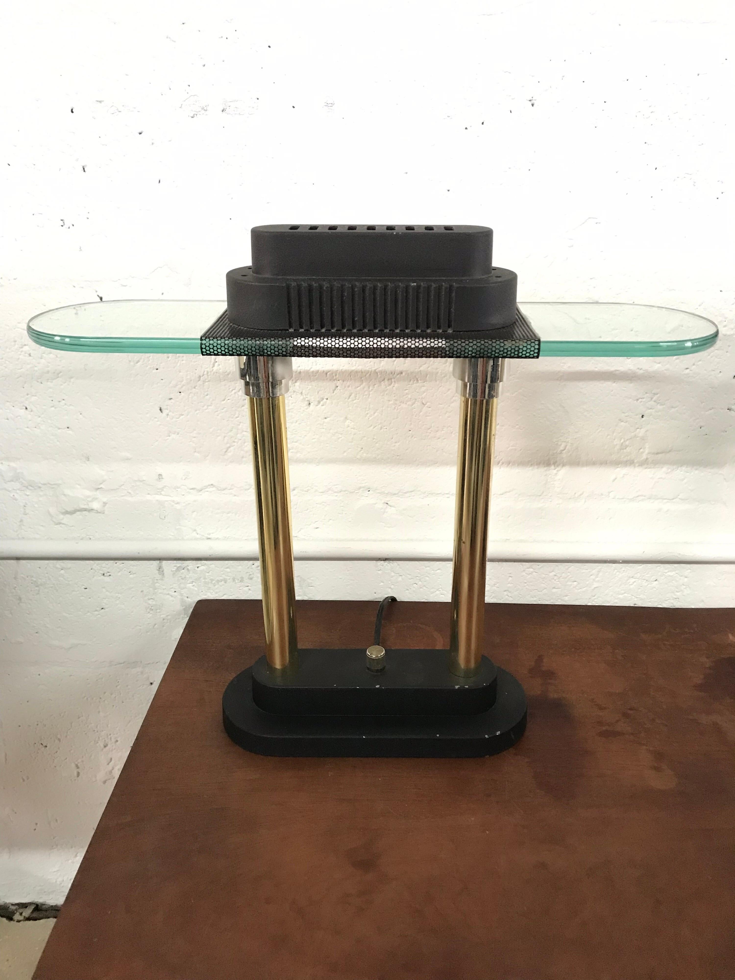 Pair of table, desk or library lamps rendered in glass, brass, chrome, and black painted and perforated steel in the style of Ettore Sottsass for Memphis Group, by Robert Sonneman for George Kovacs, Postmodern.