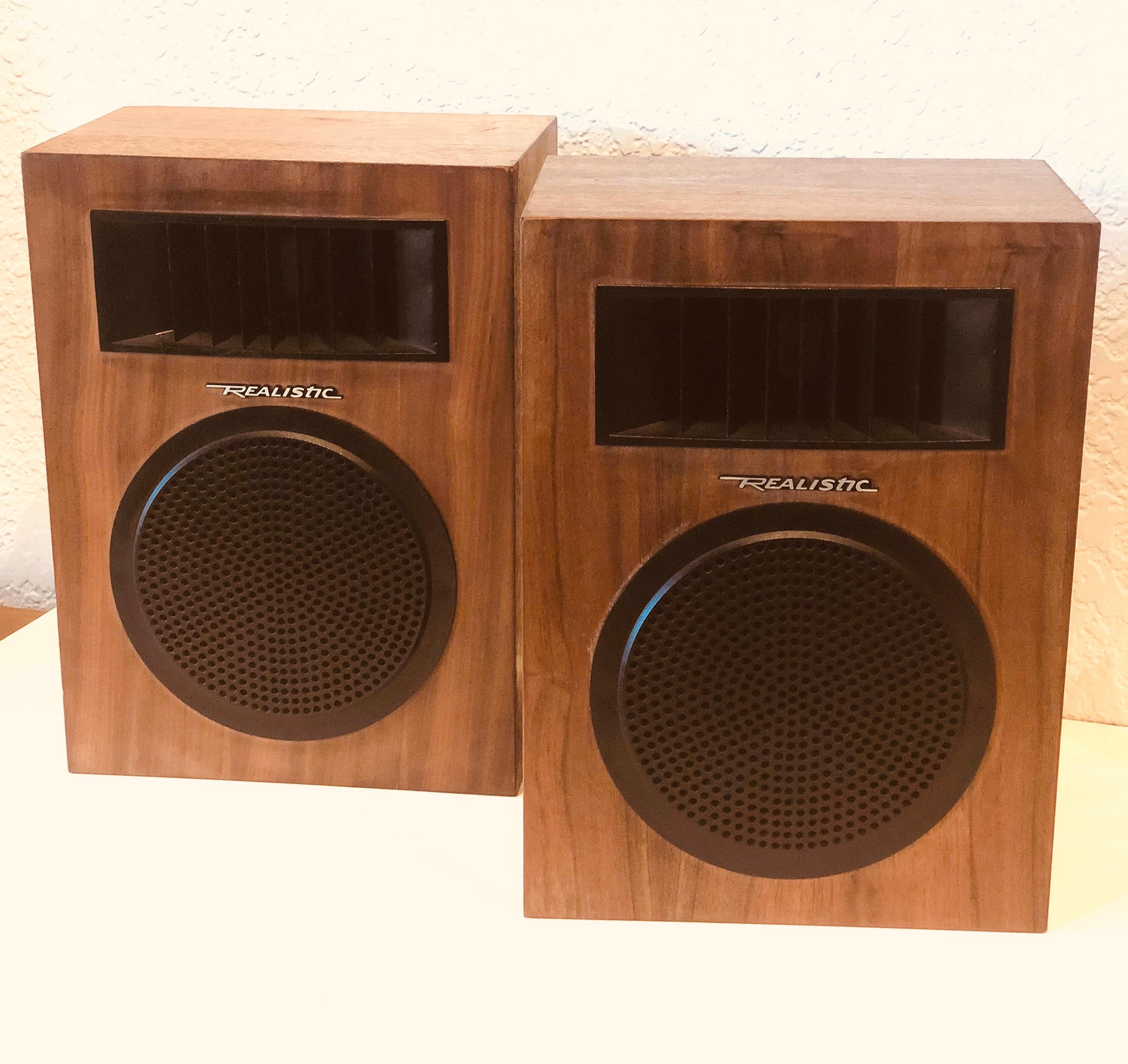 A very cool great-looking speakers by Realistic circa 1980s nice walnut cases, and in working condition we have cleaned and oiled the boxes some little chips nothing major, can be used with RCA cables or directly to the speaker as shown versatile