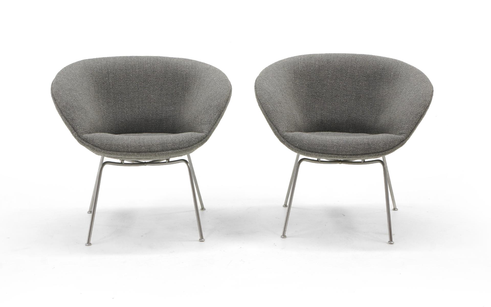 Pair of Arne Jacobsen Pot Chairs manufactured by Fritz Hansen, Denmark. The original chairs have been expertly restored and reupholstered in a medium grey / grey Maharam fabric. All new foam and batting. The original finish on the legs show some