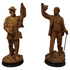 Paire de figurines de chasseurs de la Black Forest en poterie   Une très belle paire  