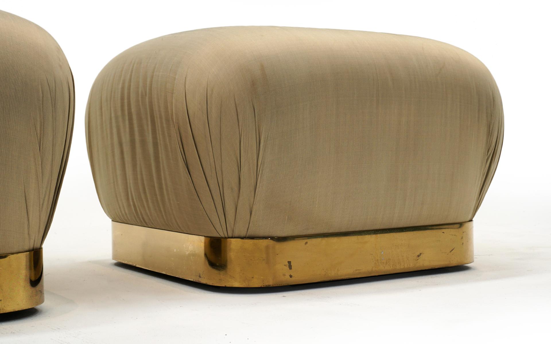 Hollywood Regency Pair of Poufs / Ottomans by Karl Springer, Original Tan / Taupe Fabric, Brass For Sale
