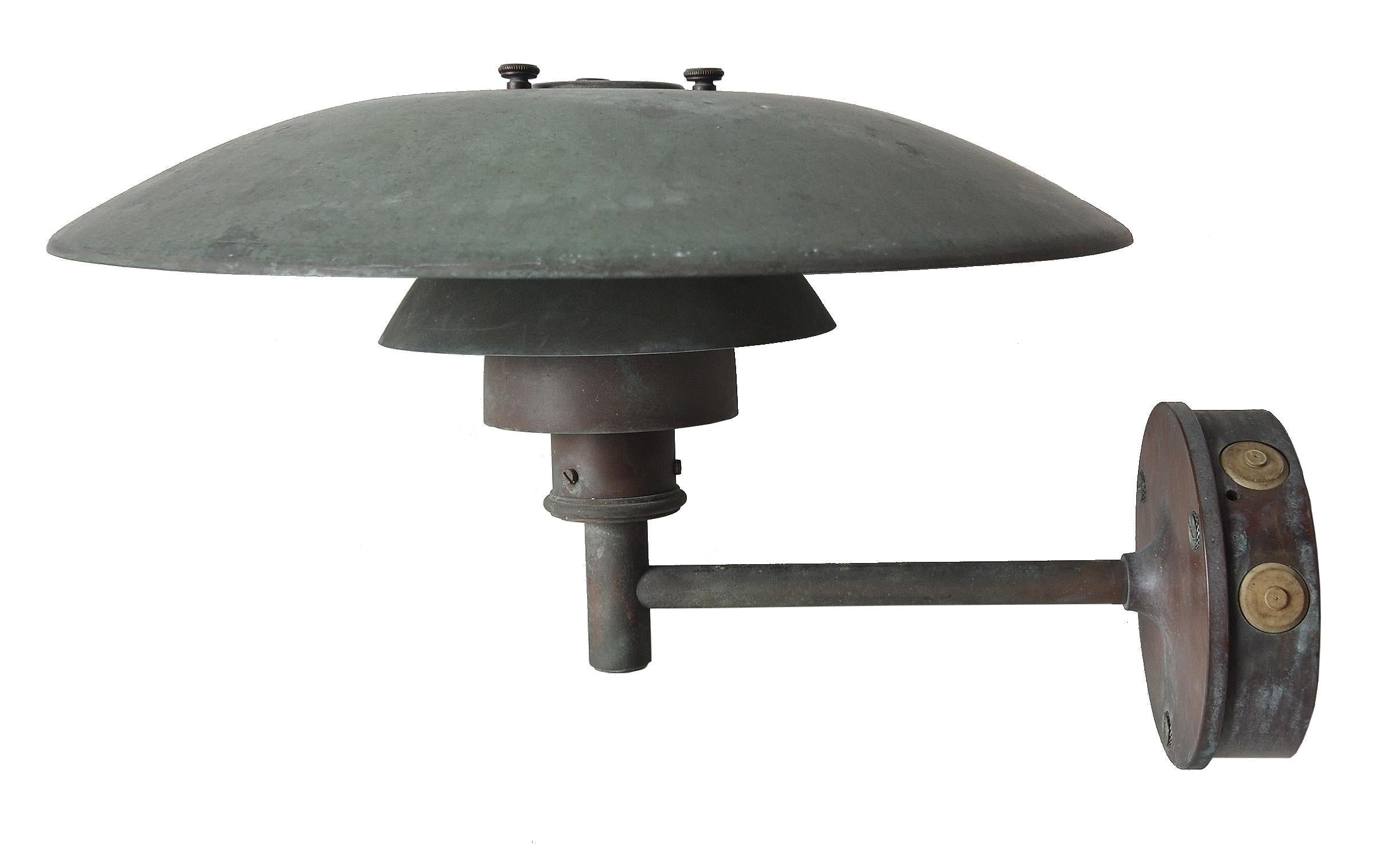 Poul Henningsen design copper wall lamps, model 4,5 /3, manufactured by Louis Poulsen. Incredible paying on these. An iconic lamp brought to the outdoors.
Please note:
These have been newly re-wired to conform to North American standards. 

