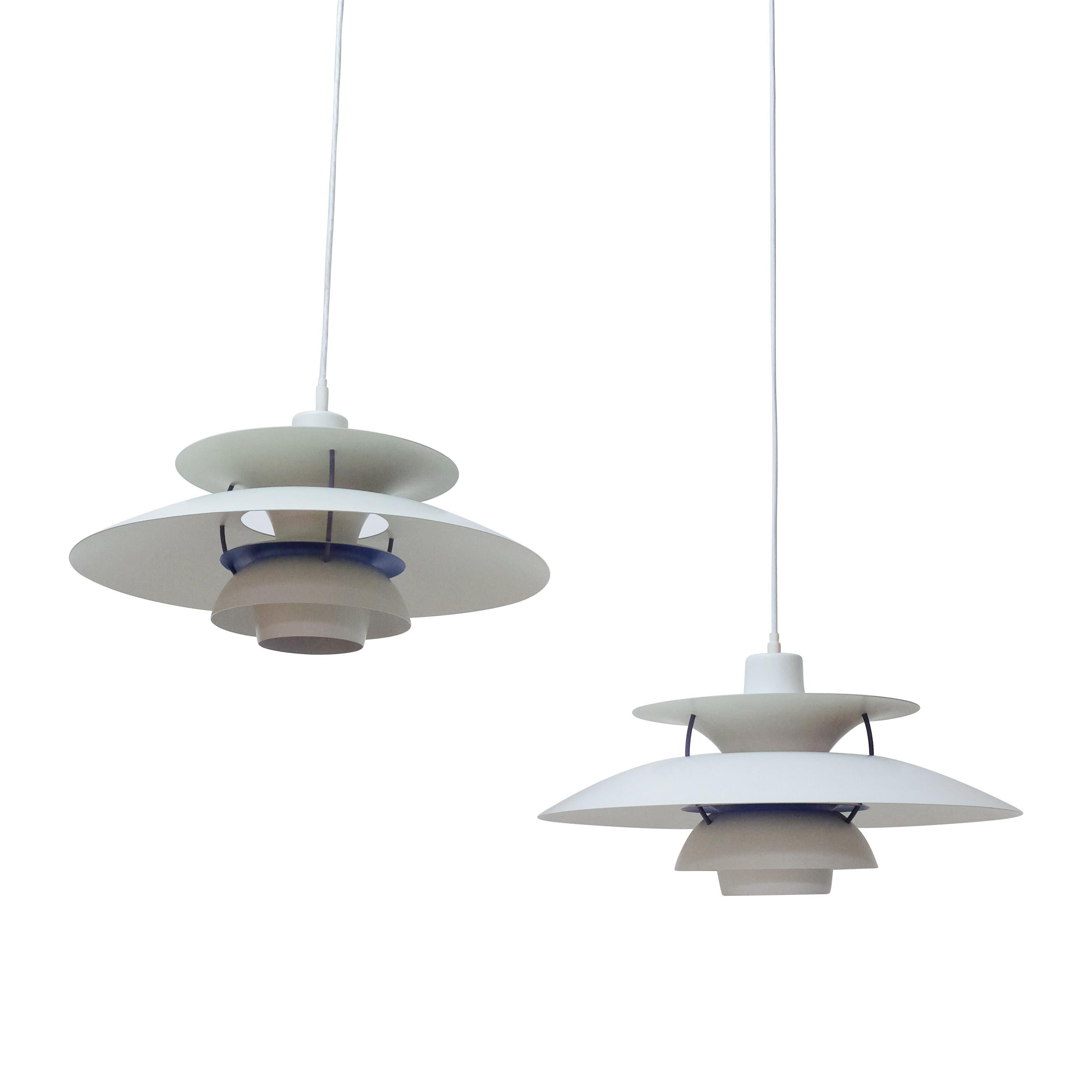 A pair of Poul Henningsen’s PH5 ceiling lamps produced by Louis Poulsen, Denmark.

The lamps are in very good condition, no scratches or noticeable signs of wear, they are tested and provided with new wiring.

Price for the pair. We have currently