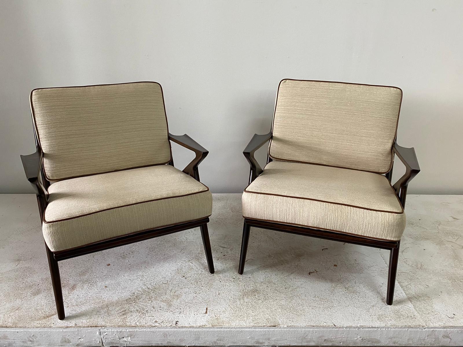 Stunning pair of Danish modern lounge chairs designed by Poul Jensen for Selig in Denmark, circa 1960s. Known as the “Z” chair for its exclusive armrests that connect to the legs and give the illusion of a letter Z. These chairs Stand out for the