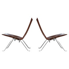Pair of Poul Kjaerholm, E. Kold Christensen Steel and Leather PK22 Lounge Chairs