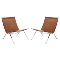 Pair Of Poul Kjaerholm PK22 Lounge Chair in Rustic Leather by Fritz Hansen