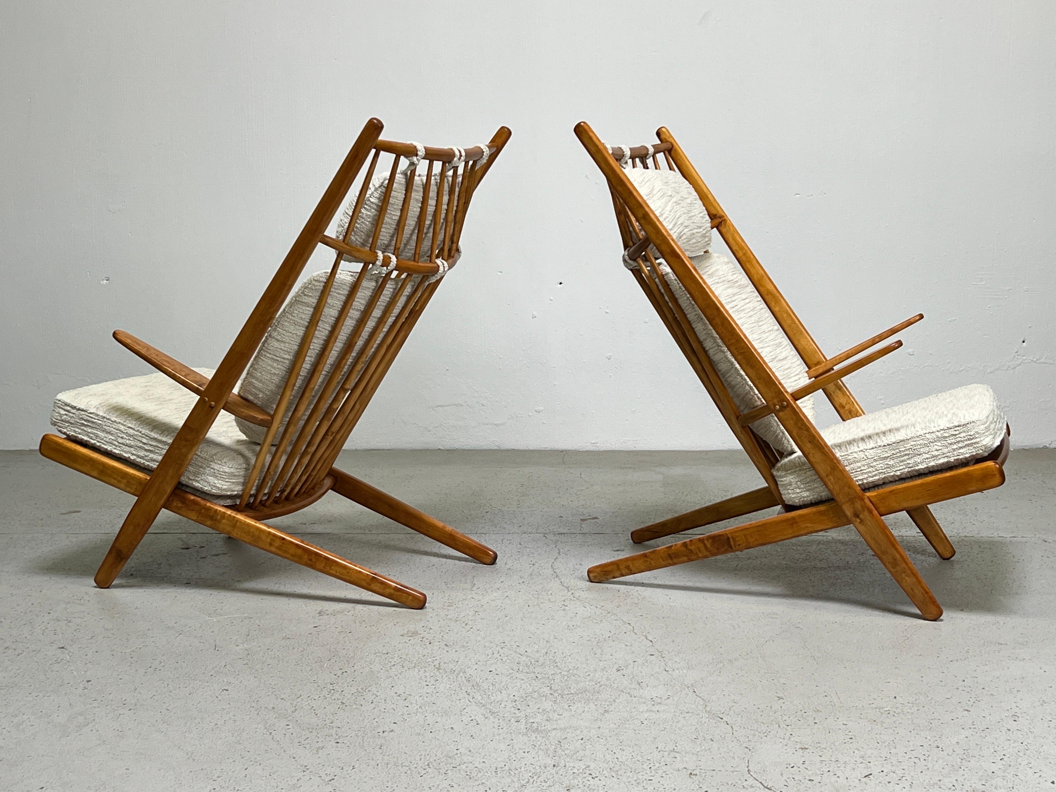 A rare pair of 'Goliat' spindle back lounge chairs designed by Poul Volther for Gemla of Sweden. Refinished and reupholstered in Holly Hunt fabric.