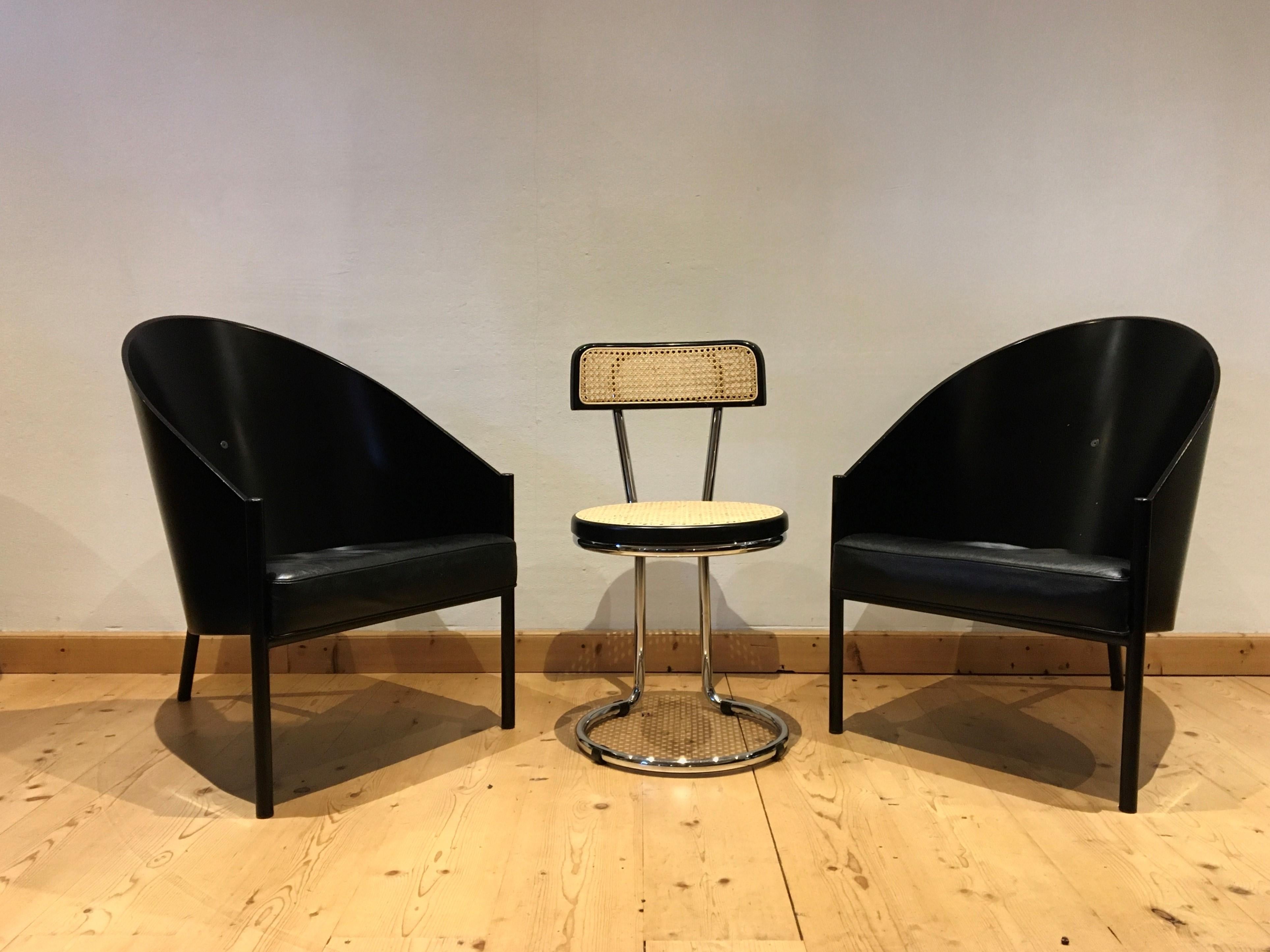 Set of 2 iconic armchairs or lounge chairs designed by Philippe Starck and made by Driade Aleph Italy. 
This model called Pratfall is larger then the Starck model Costes chair, 
what makes these chairs great as lounge chairs, hall chairs, side