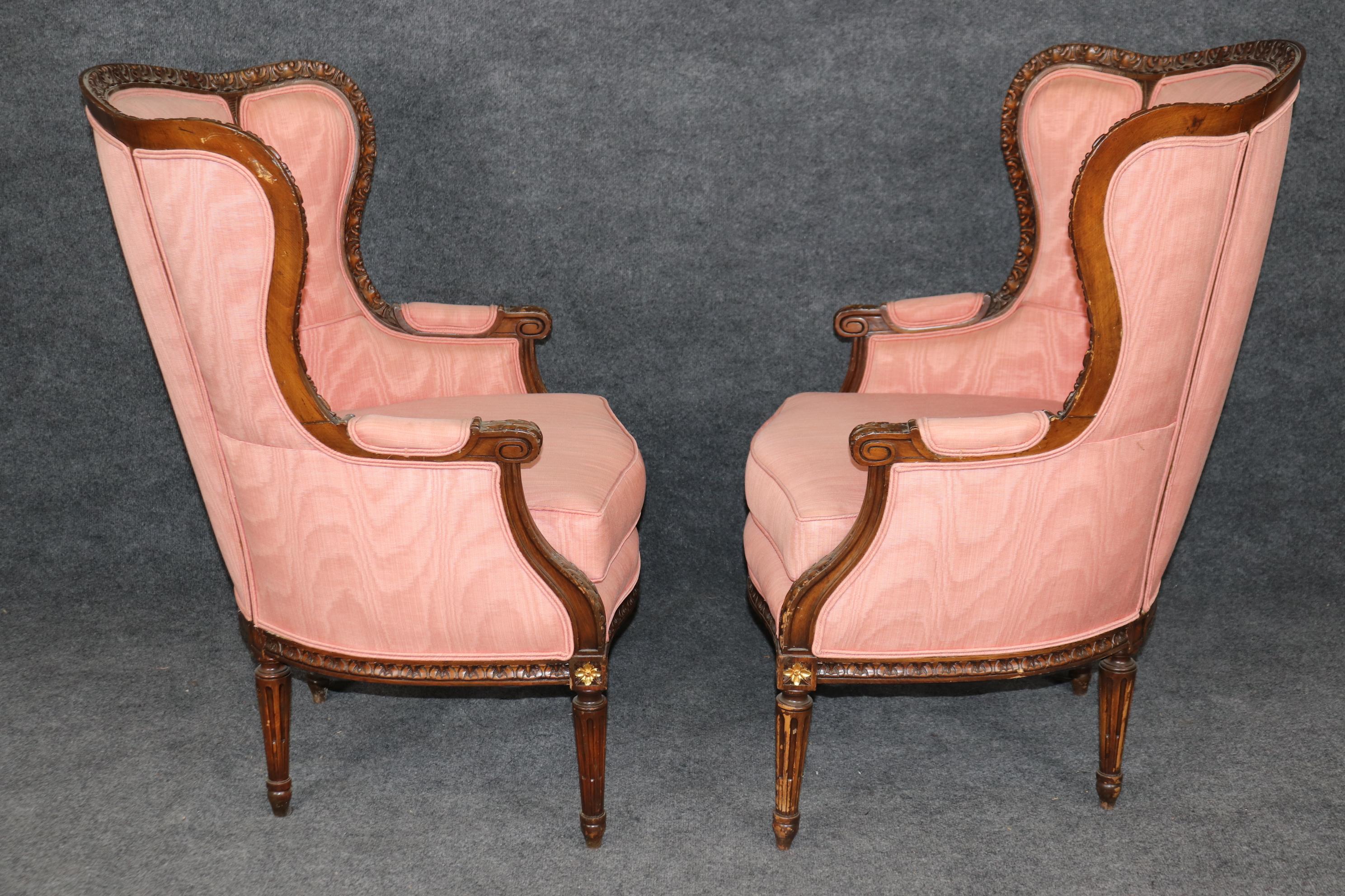 Mid-20th Century Pair of Precisely Carved French Walnut Bergere Wing Chairs Circa 1930s For Sale