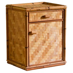 Pair of pressed bamboo bedside tables with drawer and door, 1980