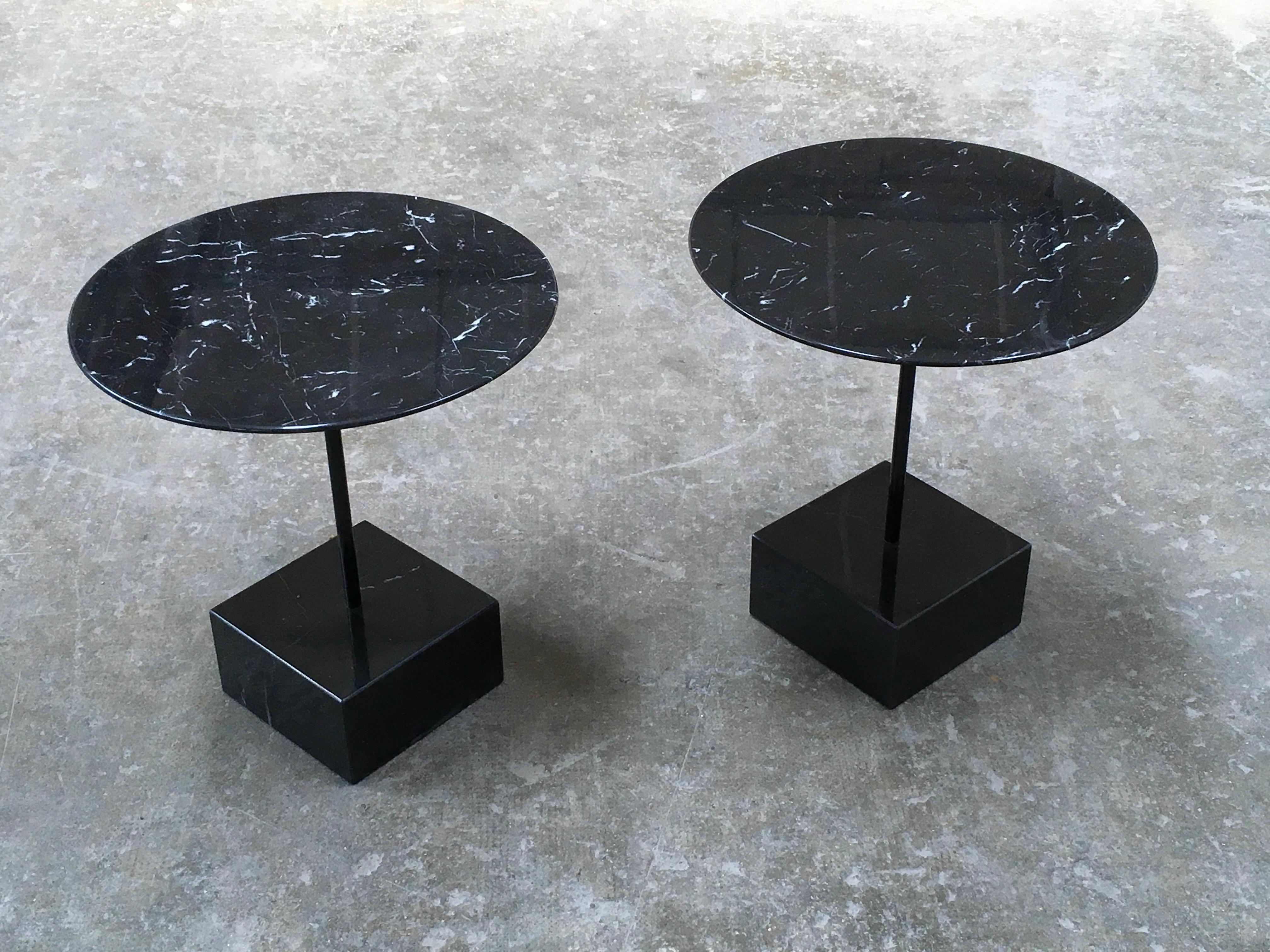 Pair of primavera coffee tables model in black marble and painted metal, designed by Ettore Sottsass and produced by Ultime Edizioni, 1980.