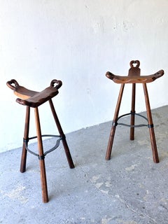 pair of Primitive Carved Wood “Birthing” Bar Stools