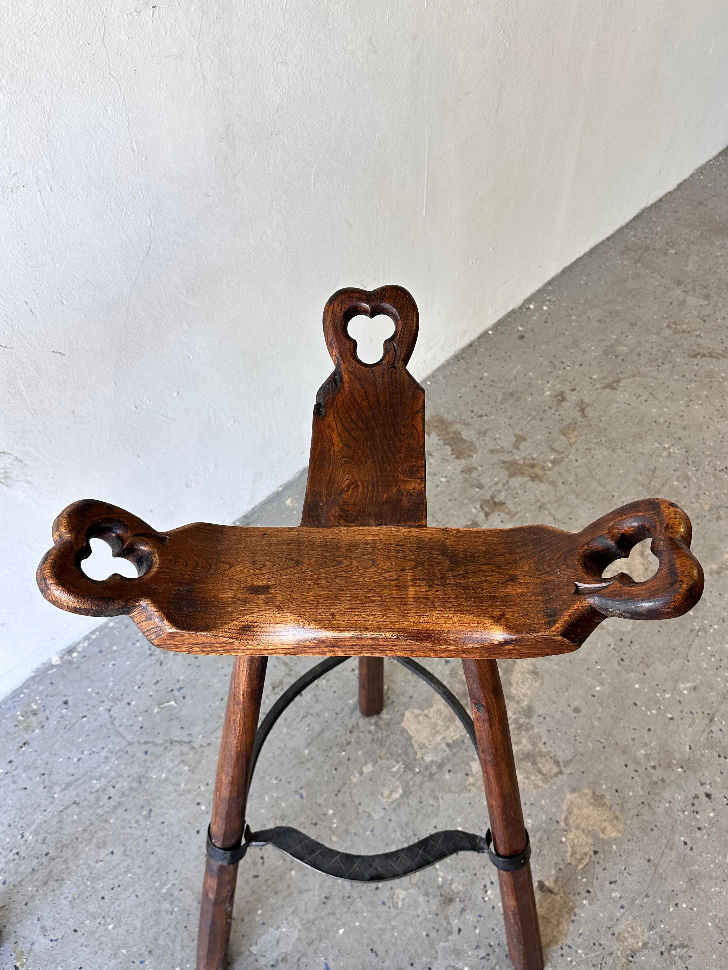 Unknown pair of Primitive Carved Wood “Birthing” Bar Stools