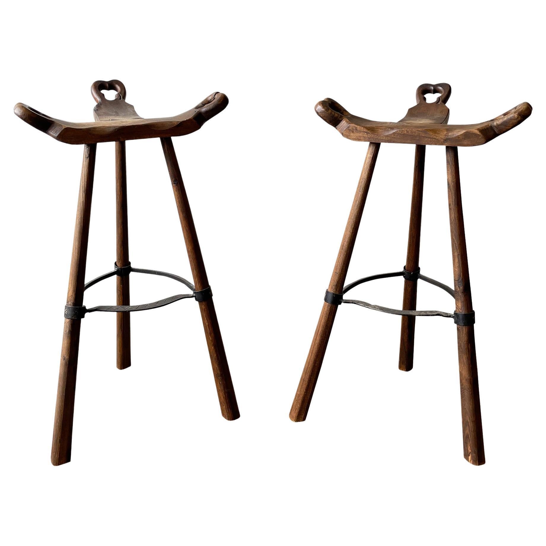 Pair of Primitive Carved Wood “Birthing” Bar Stools